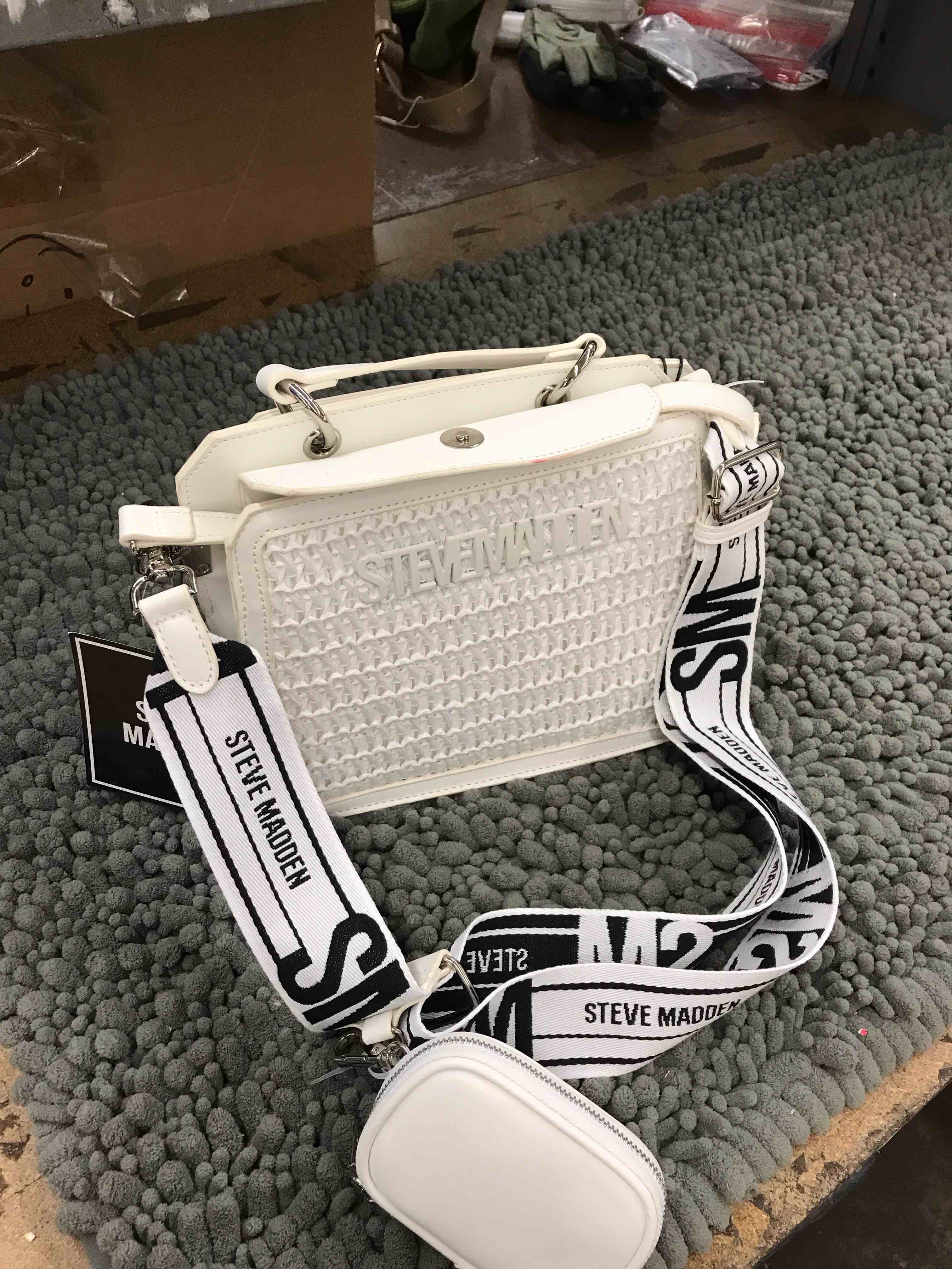 Condition photo showing New/Like New for steve madden purse