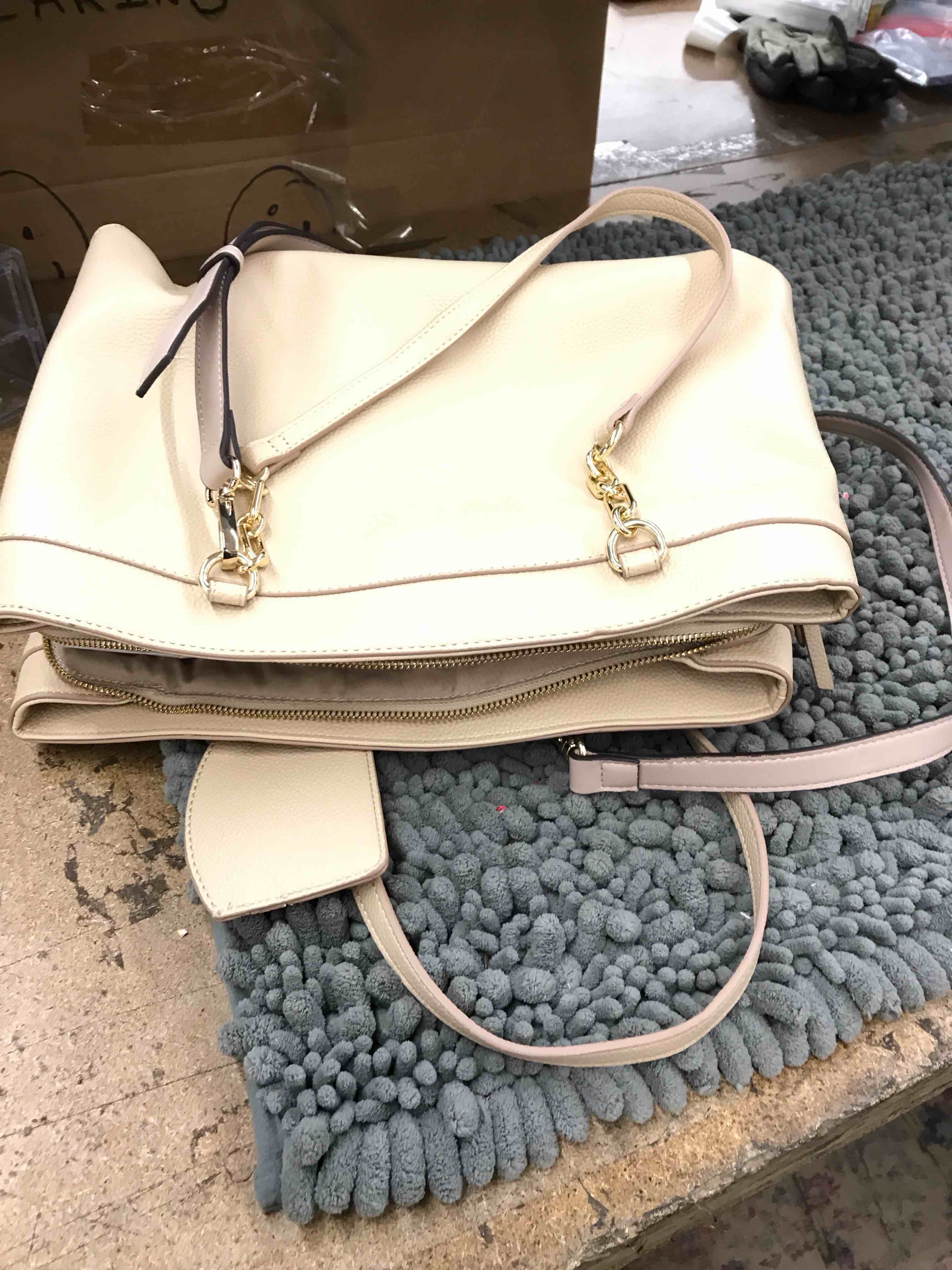 Condition photo showing New/Like New for nanette lepore purse