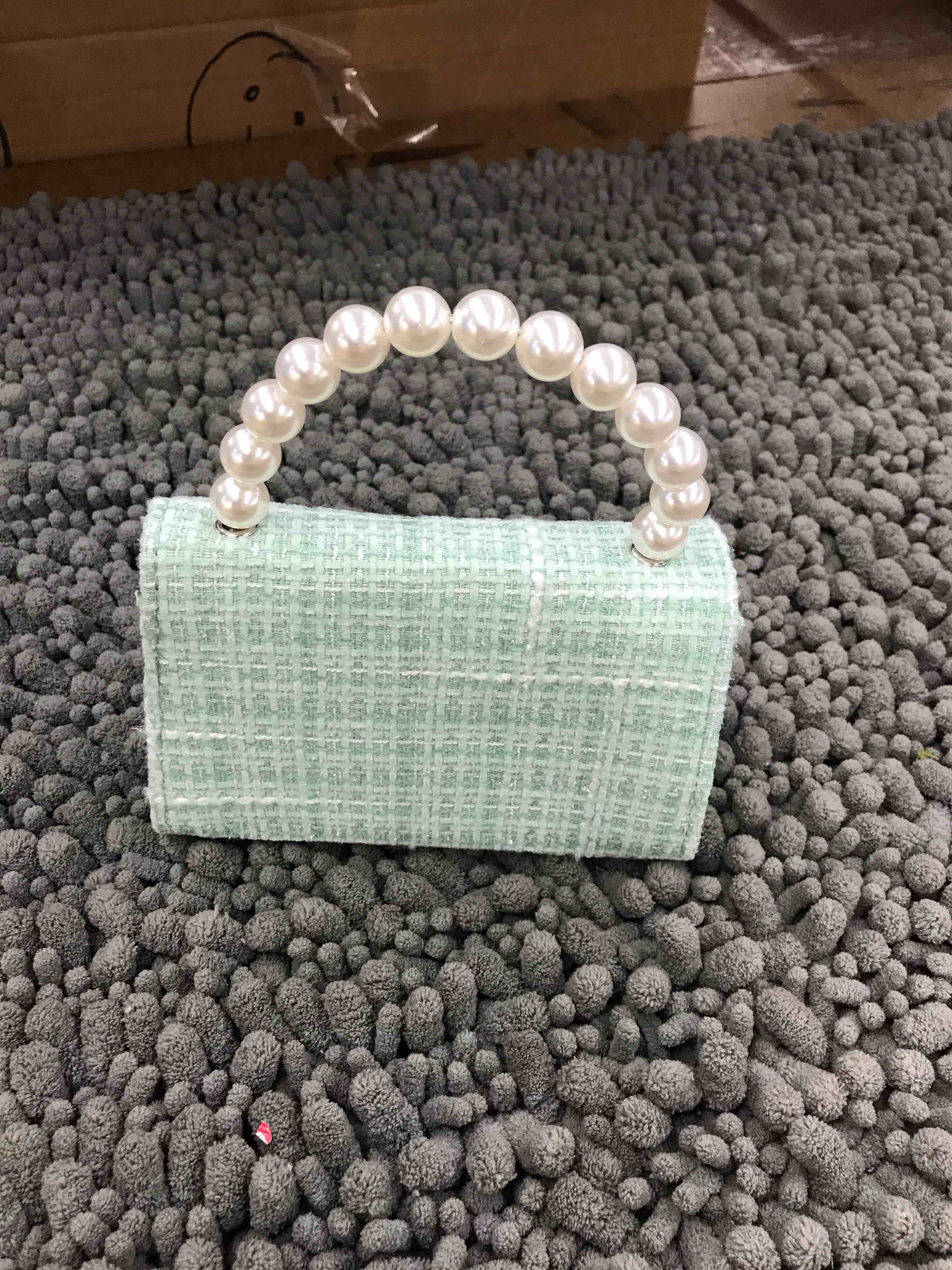 Condition photo showing New/Like New for green purse 