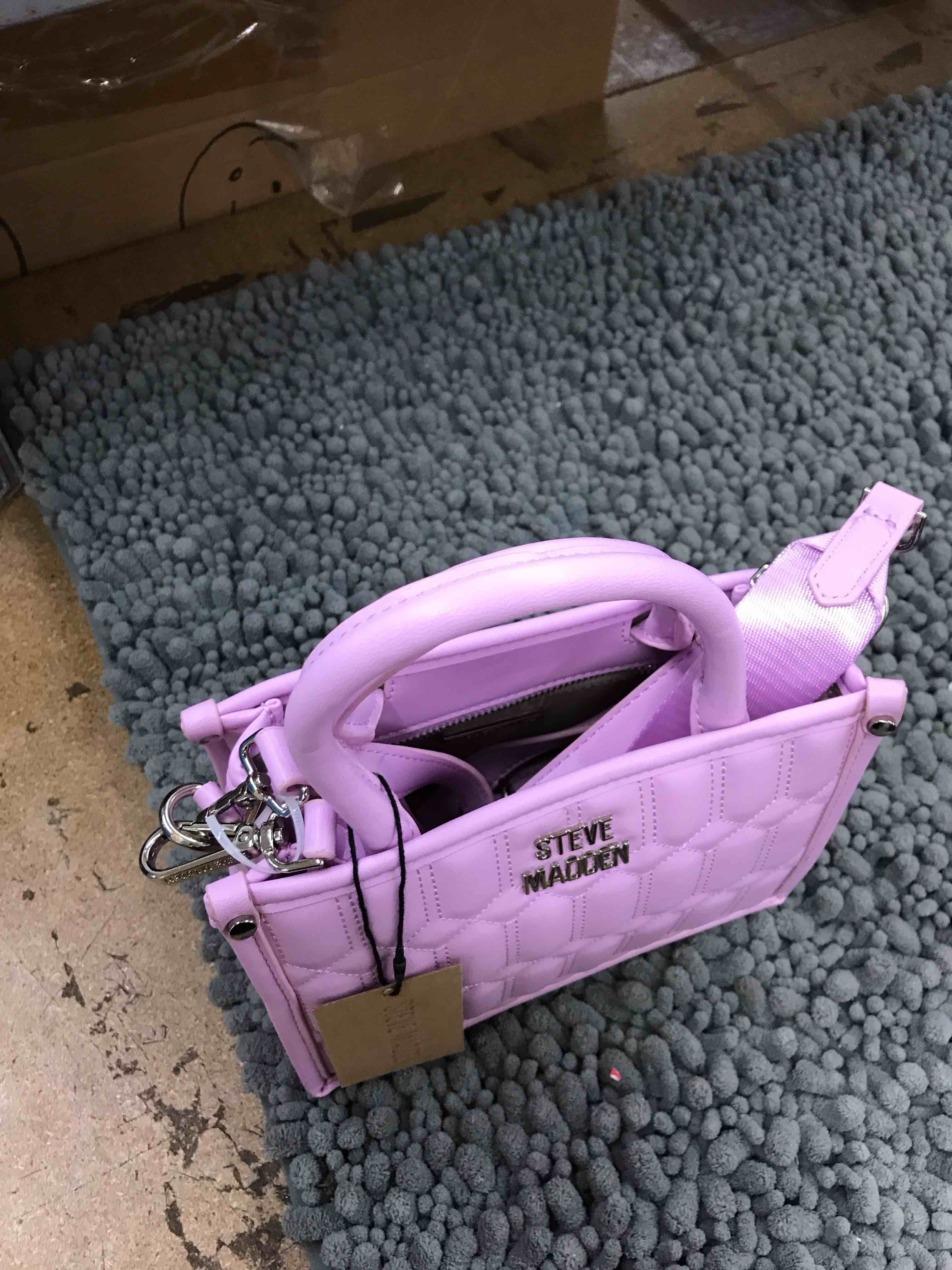 Condition photo showing New/Like New for steve madden purse 