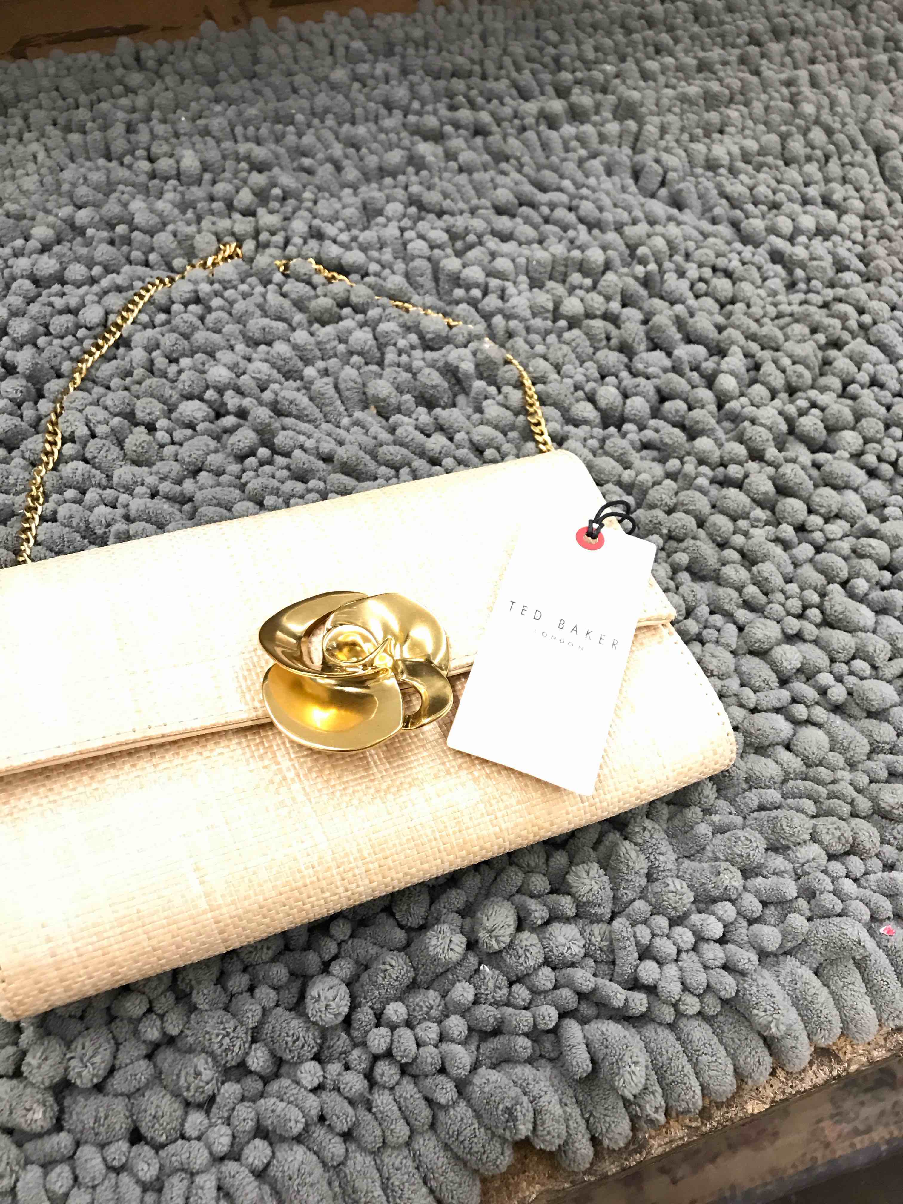 Condition photo showing New/Like New for ted baker purse