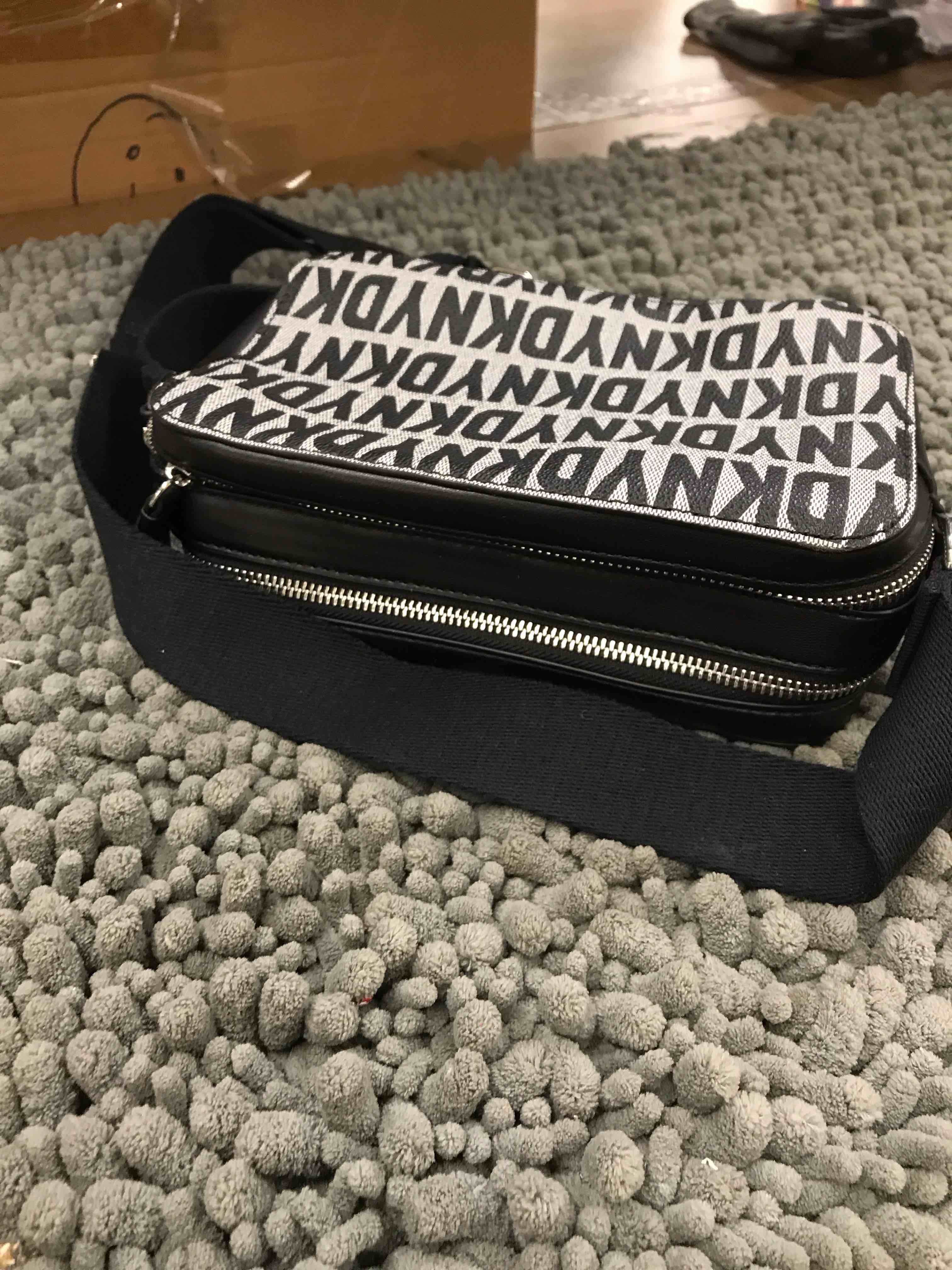 Condition photo showing New/Like New for dkny purse