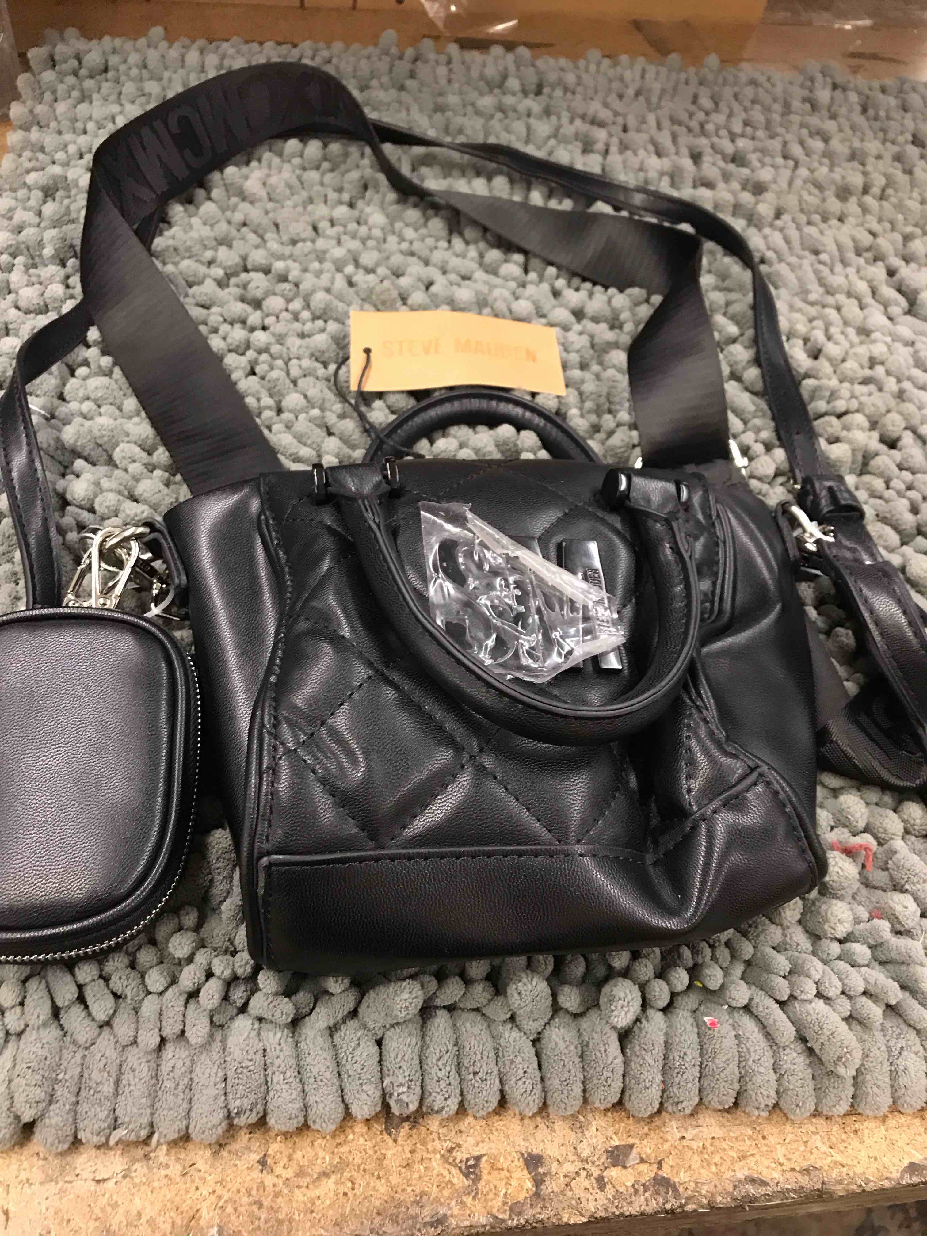 Condition photo showing New/Like New for steve madden purse