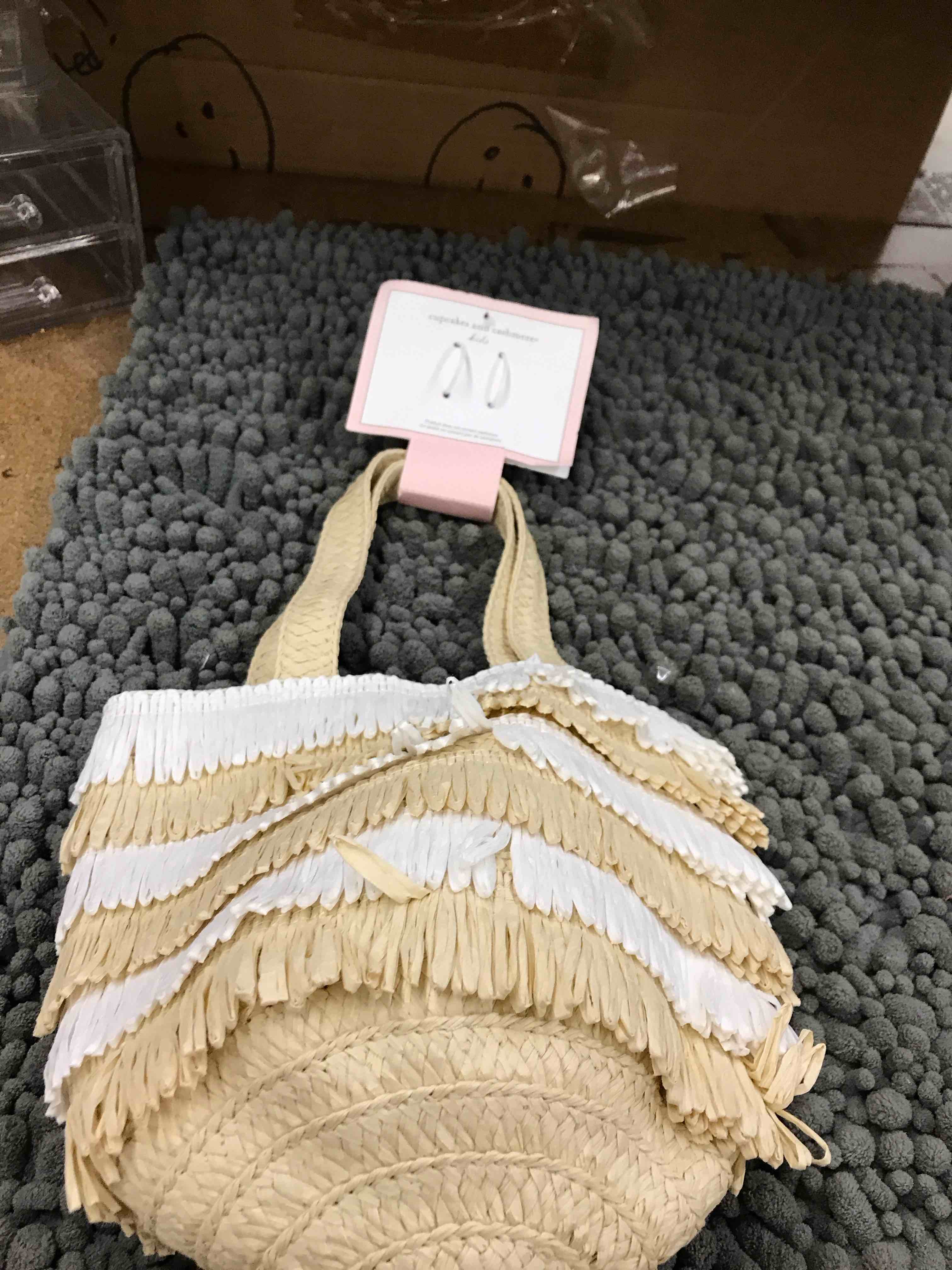 Condition photo showing New/Like New for cupcakes $ cashmere kids straw bag