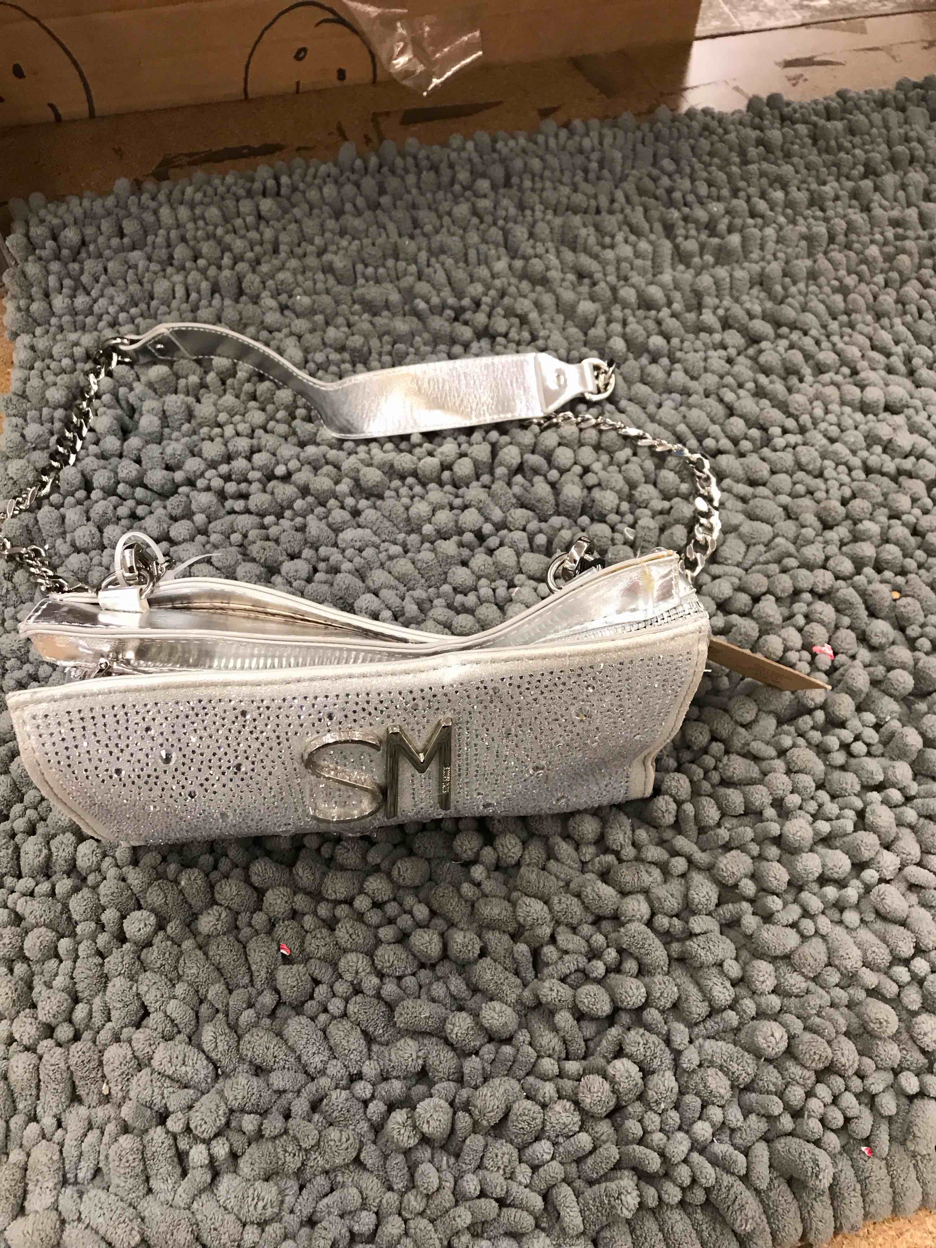 Condition photo showing New/Like New for steve madden purse