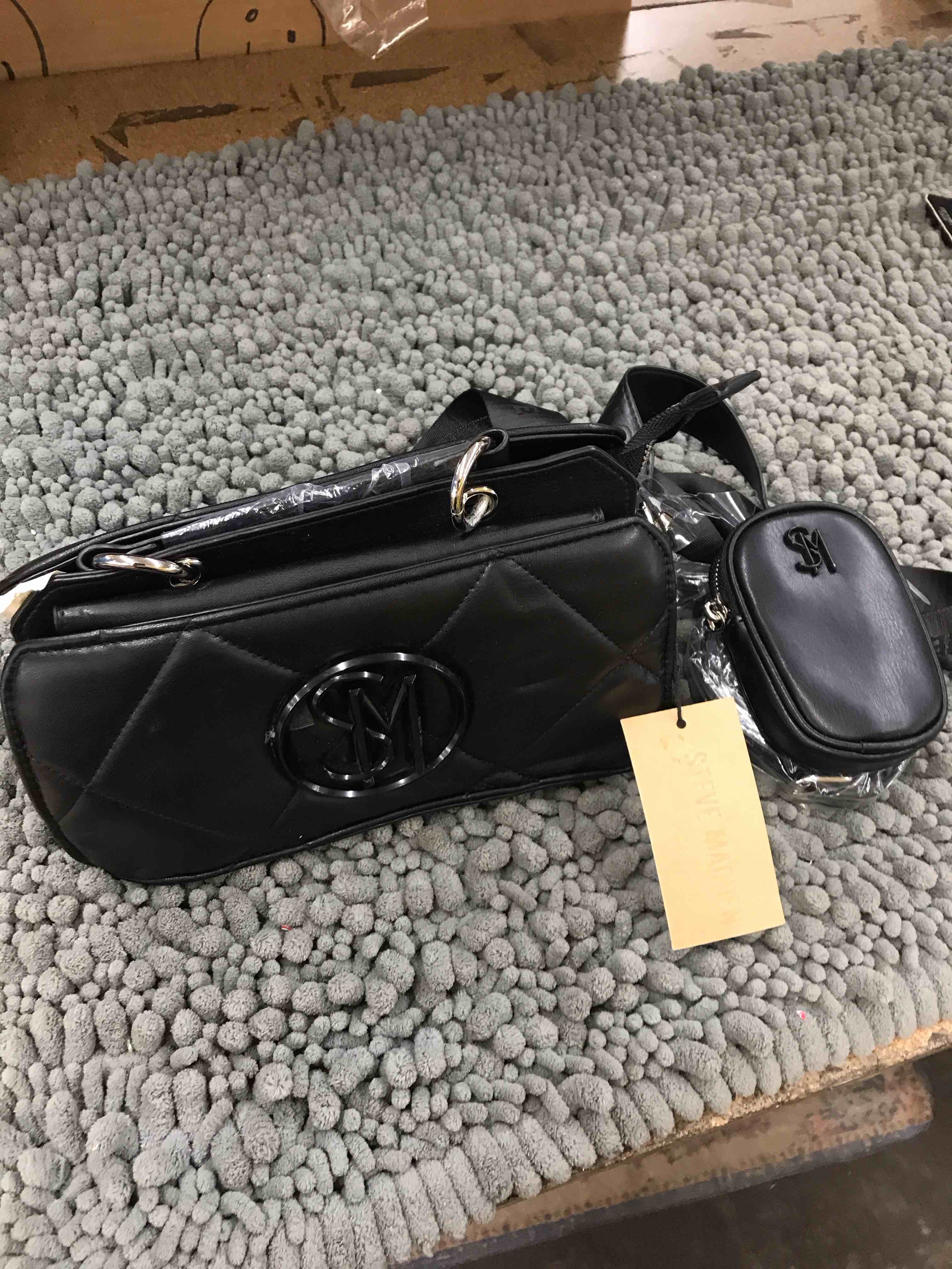 Condition photo showing New/Like New for steve madden purse