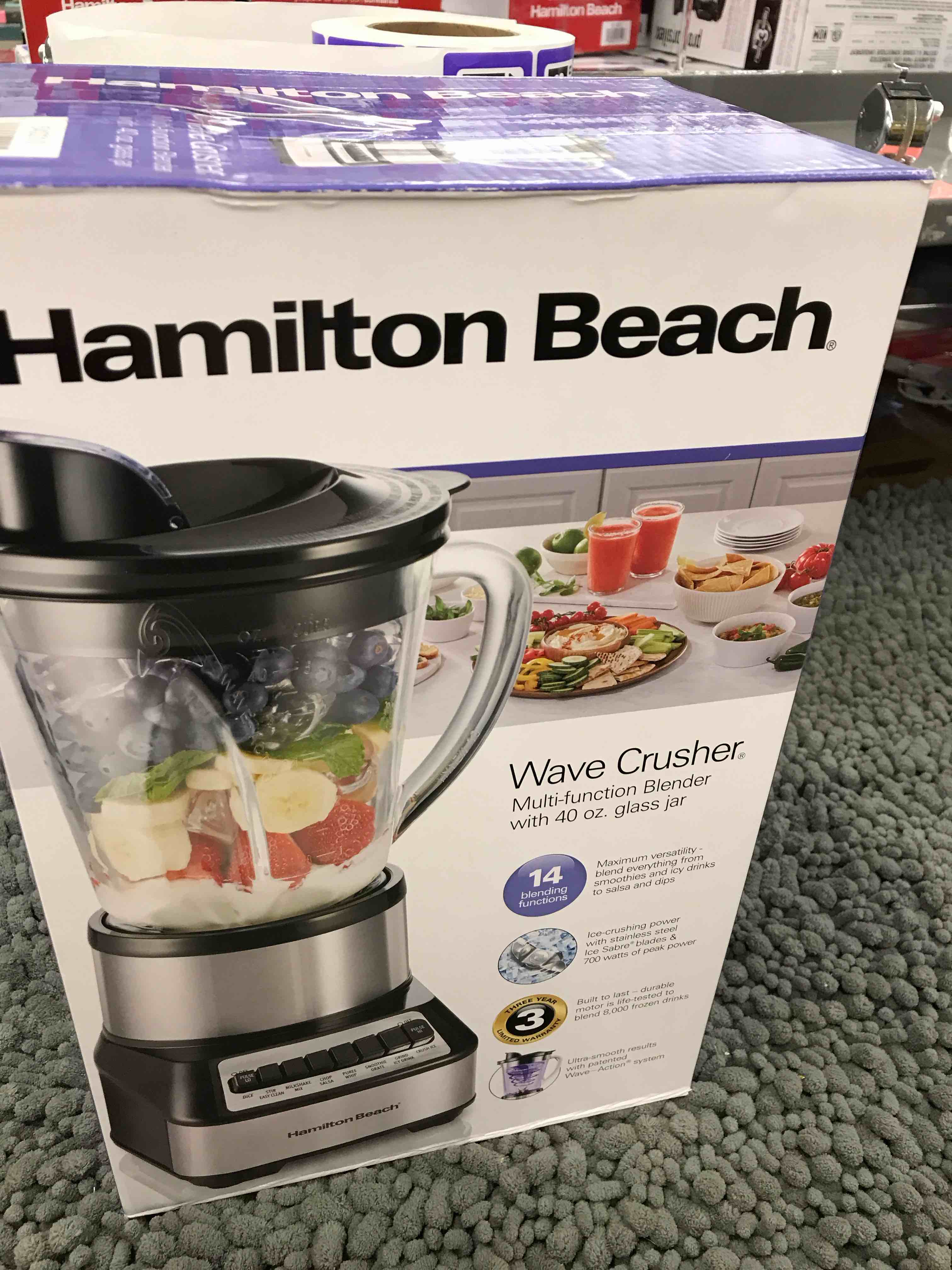 Condition photo showing New/Like New for hamilton beach wave crusher blender for smoothies with 40 oz glass jar and 14 functions, ice sabre blades & 700 watts for consistently smooth results, black + stainless steel (54221)