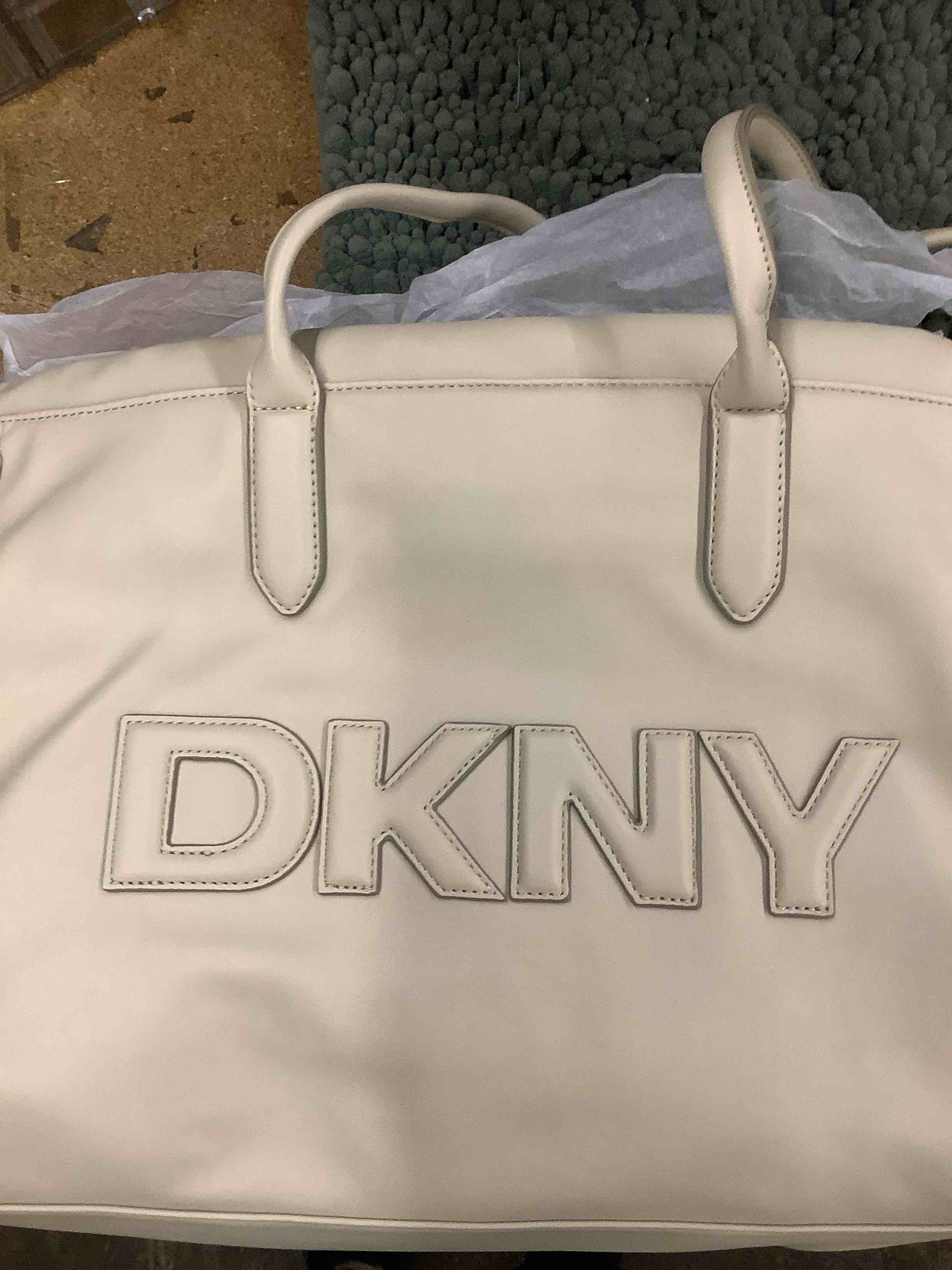Condition photo showing Good Condition for dkny bag 