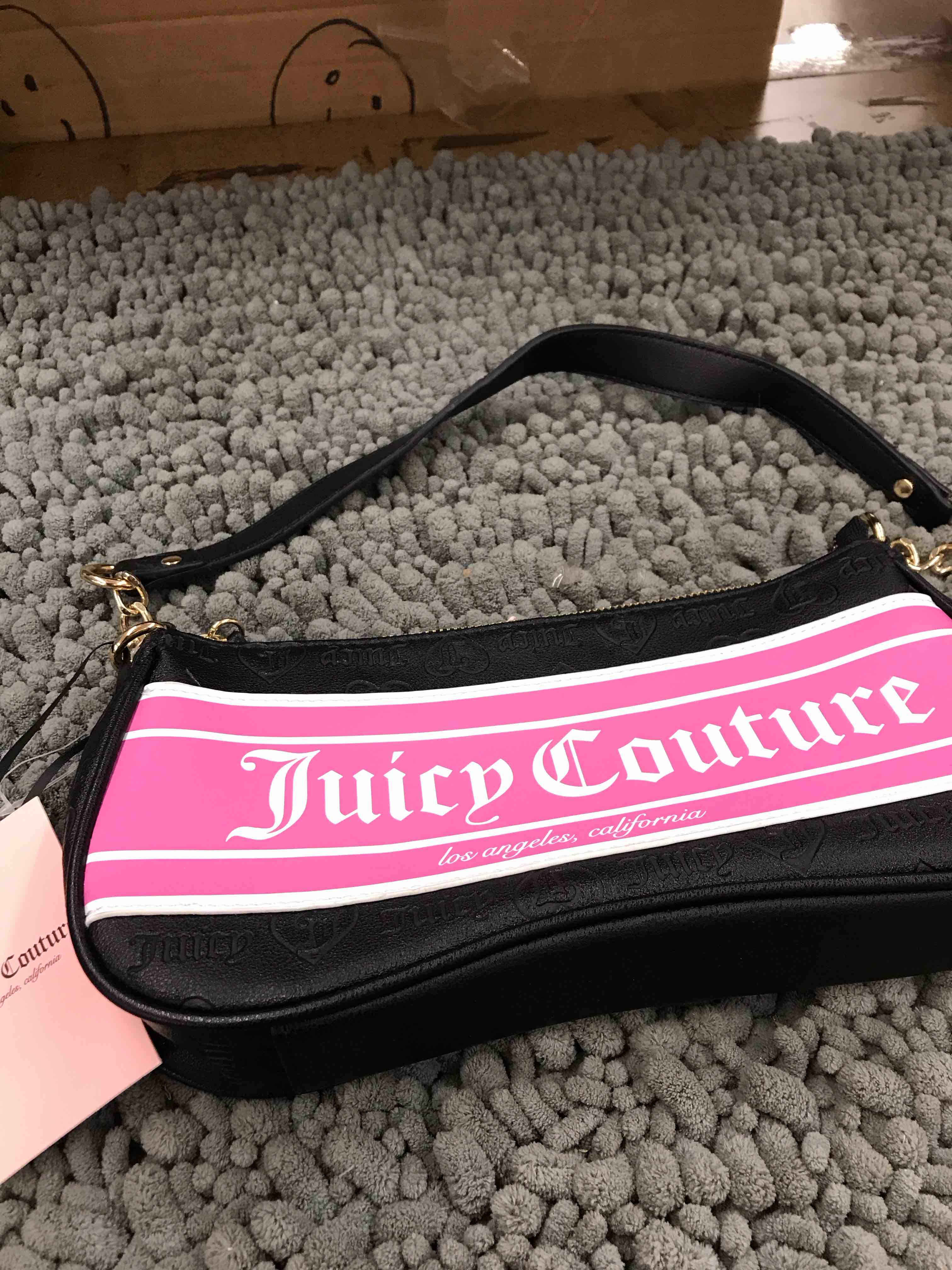 Condition photo showing New/Like New for juicy couture purse