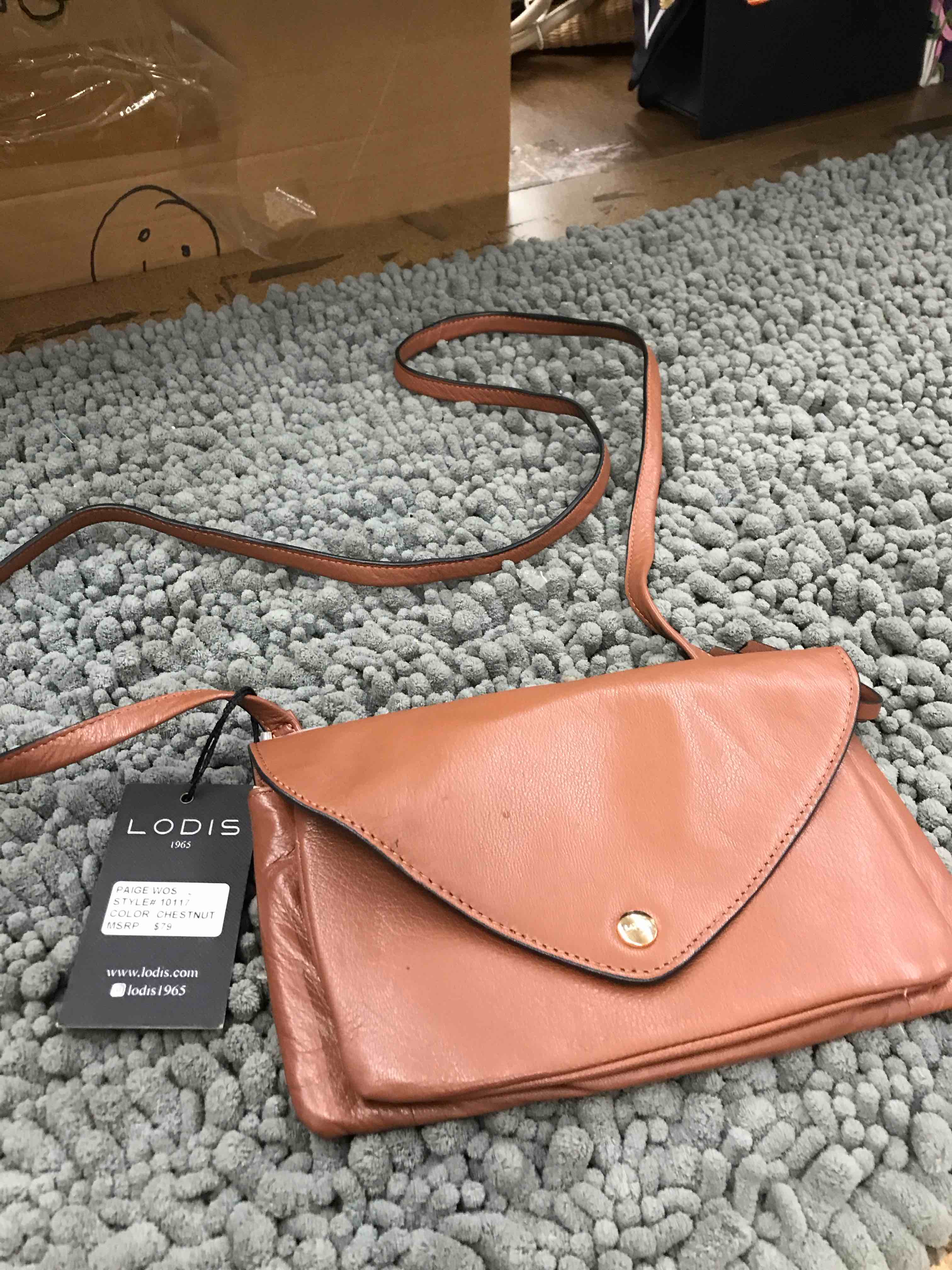 Condition photo showing New/Like New for lodi’s purse