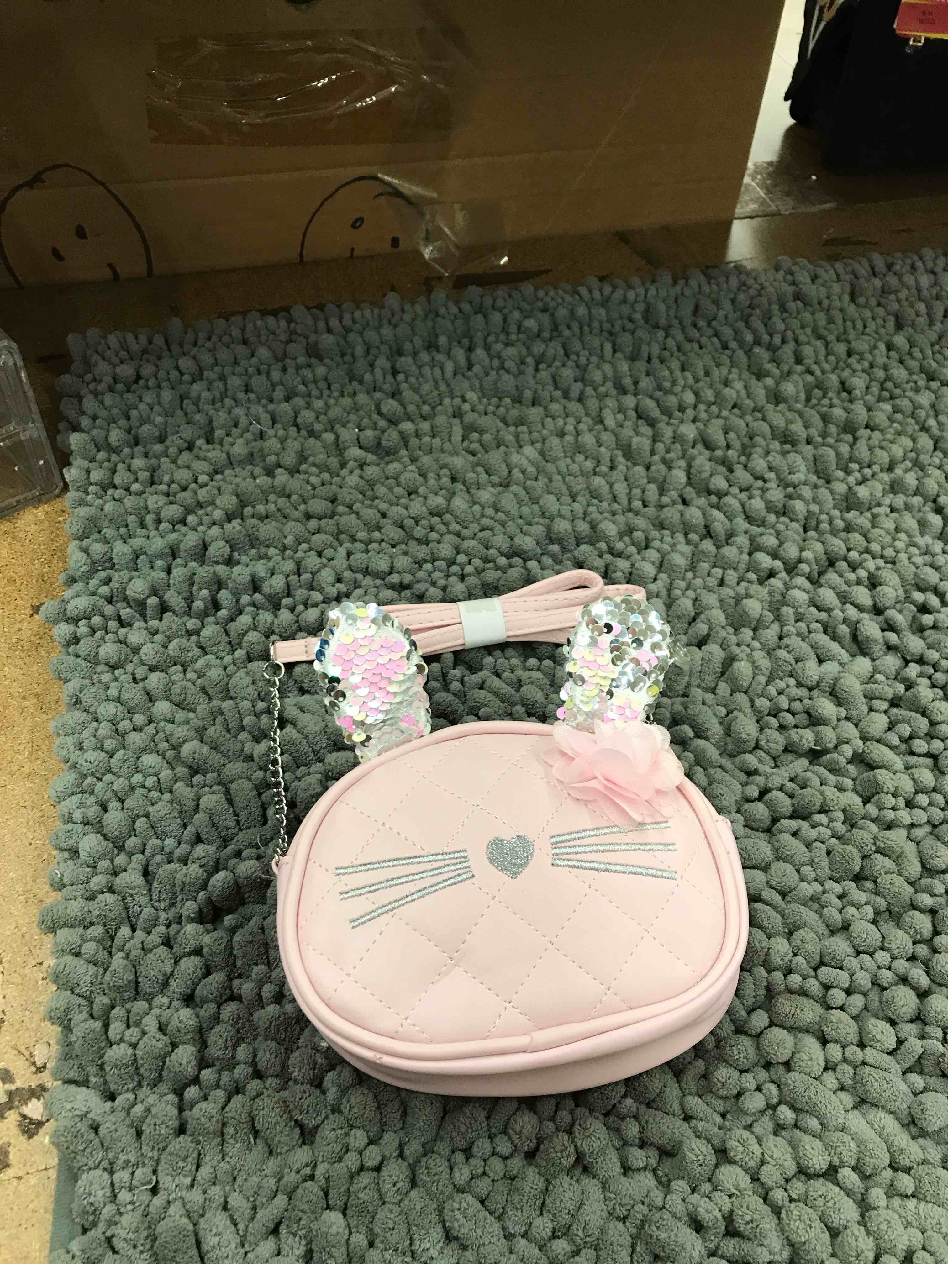 Condition photo showing New/Like New for cat kids purse