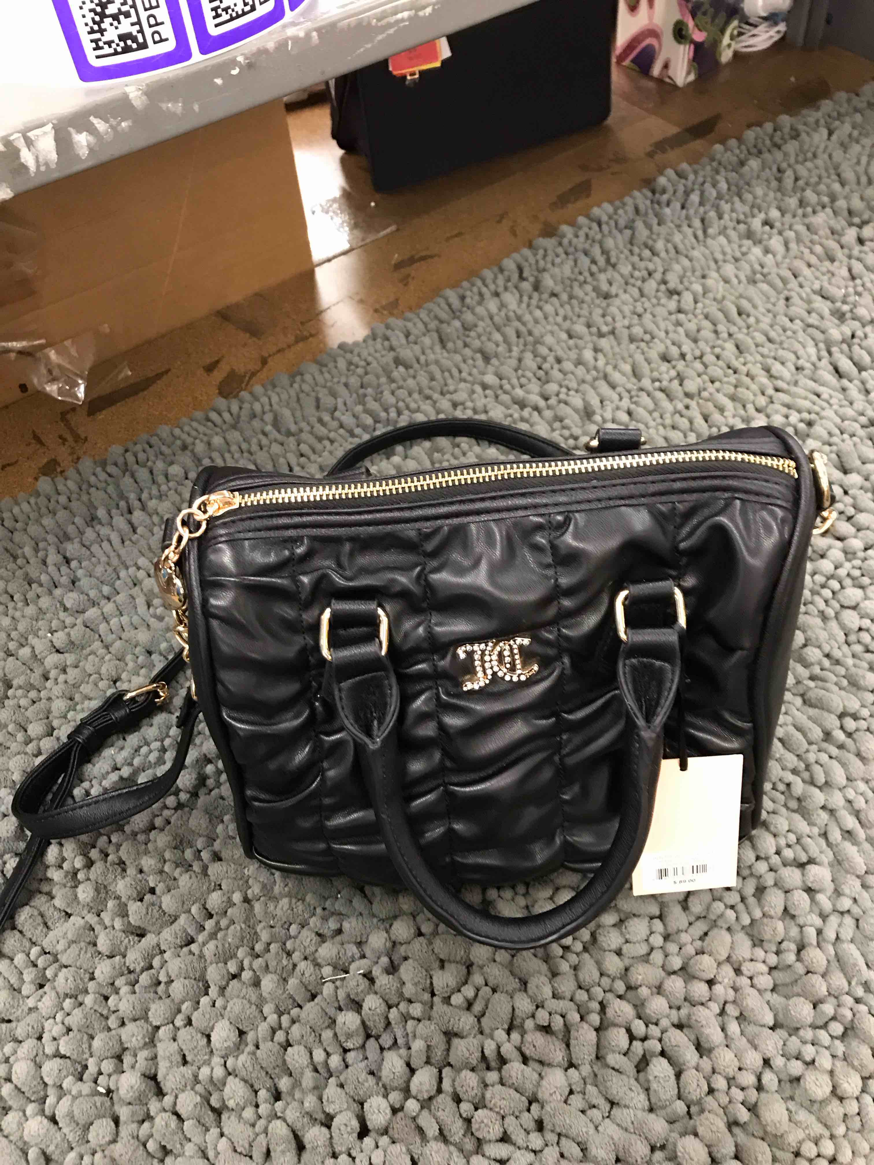 Condition photo showing New/Like New for juicy conture purse