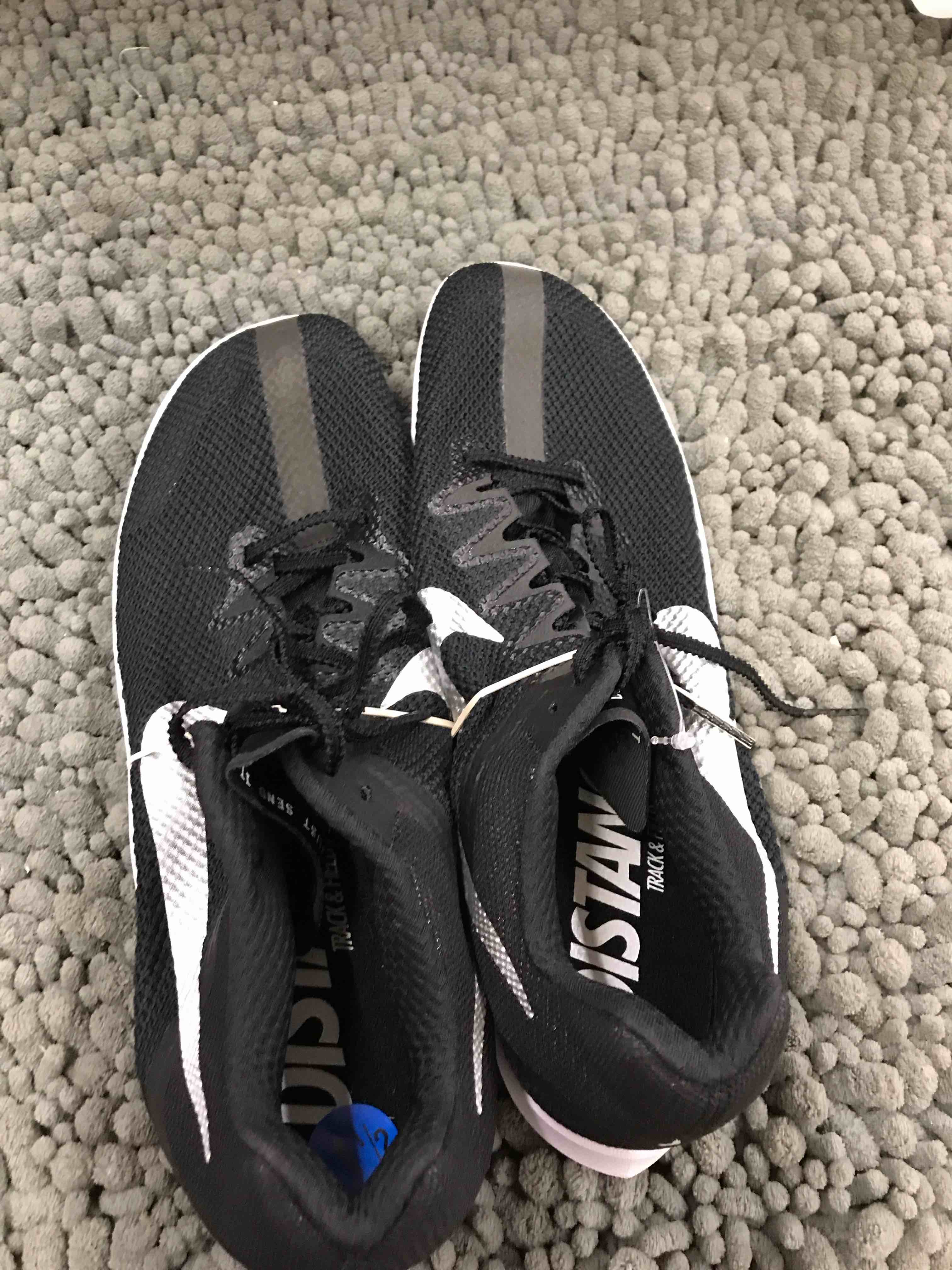 Condition photo showing New/Like New for nike distance track & field