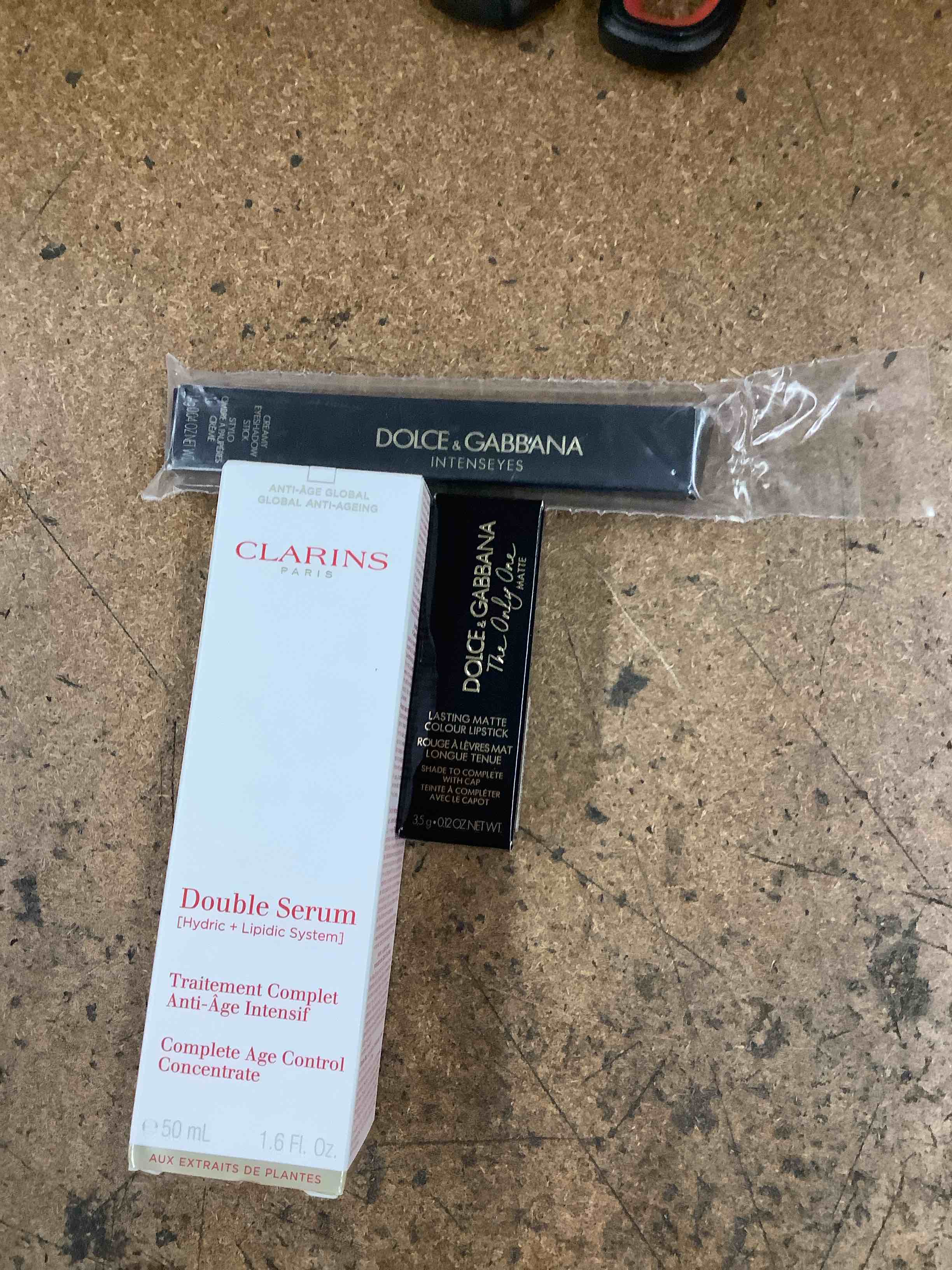 Condition photo showing Good Condition for double serum, lipstick, eyeshadow