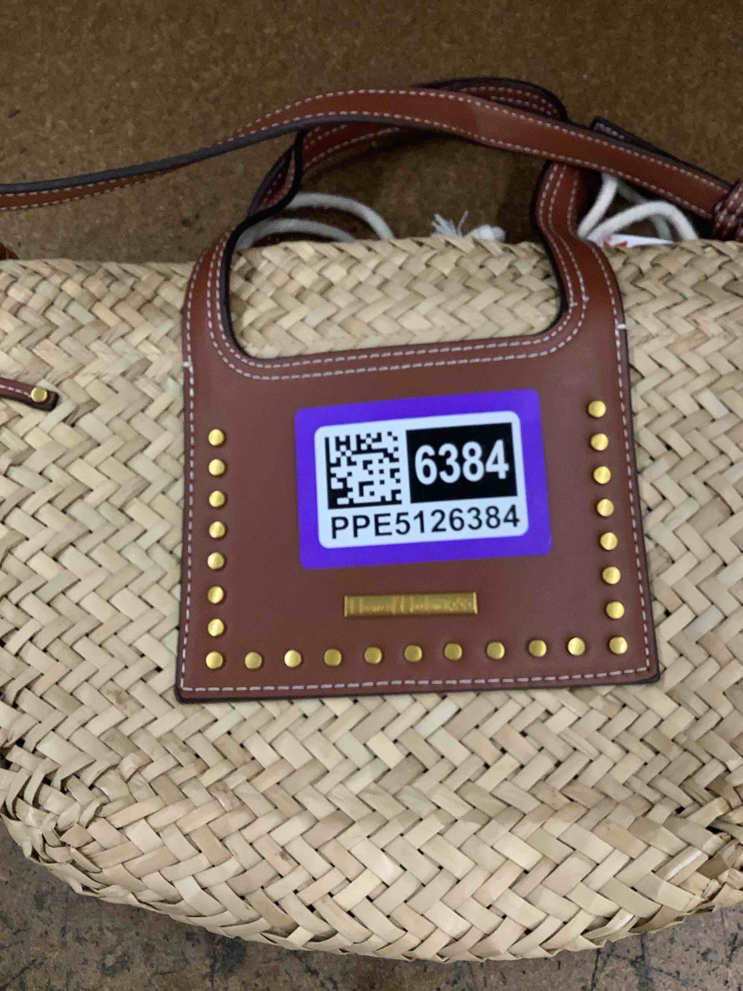 Condition photo showing Good Condition for woven purse