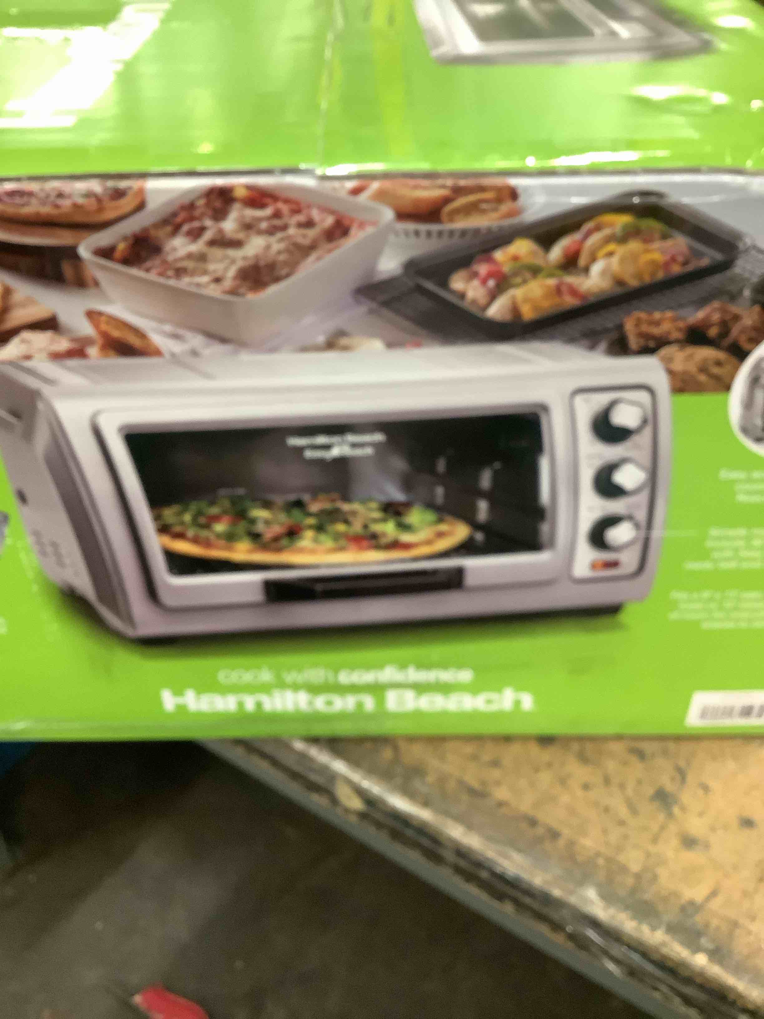 Condition photo showing Good Condition for hamilton beach 6 slice countertop toaster oven with easy reach roll-top door, bake, broil & toast functions, auto shutoff, silver (31127d)