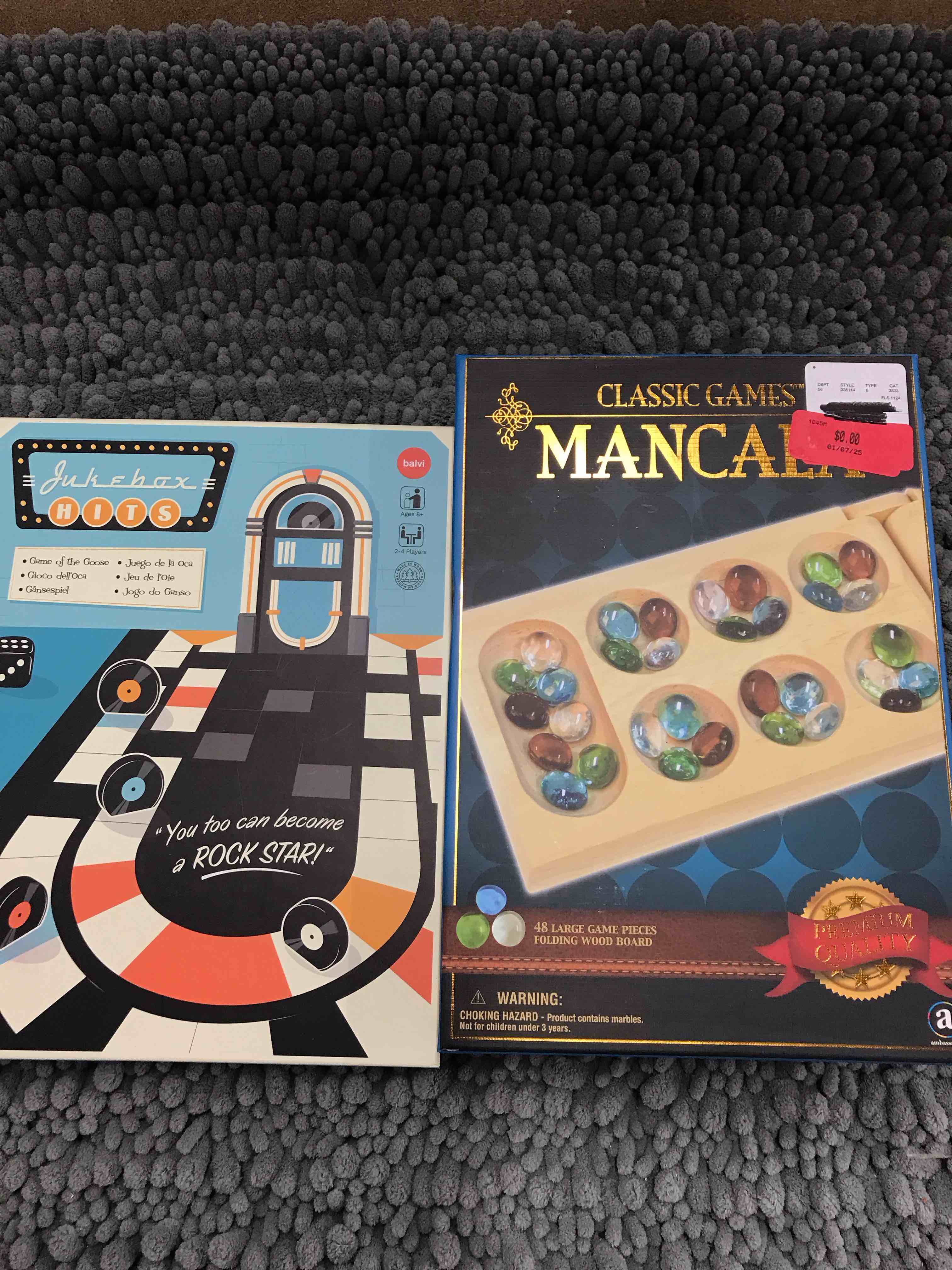 Set of 2 Games.    Mancala and a jukebox Hits