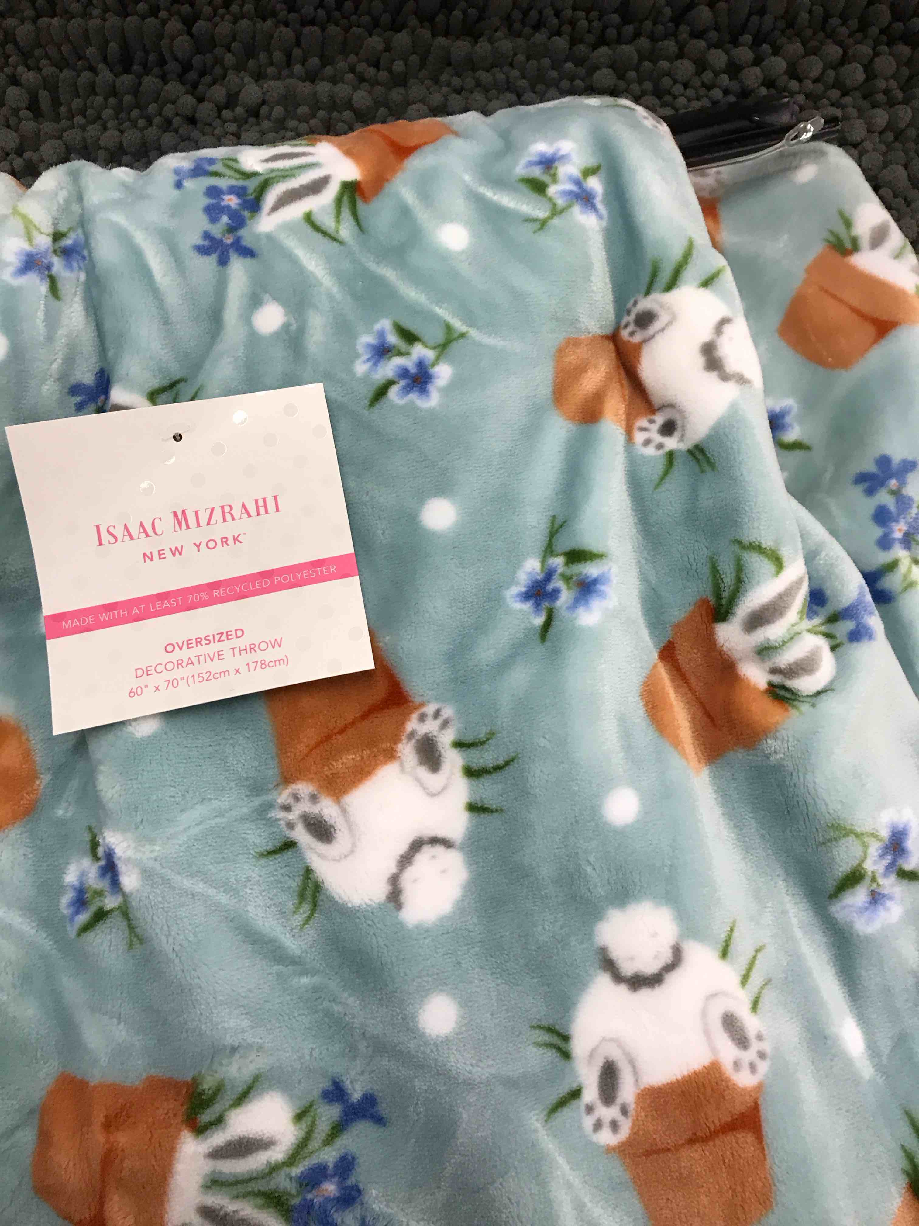 Condition photo showing New/Like New for Isaac Mizrahi Plush Blanket.     60 x 70”