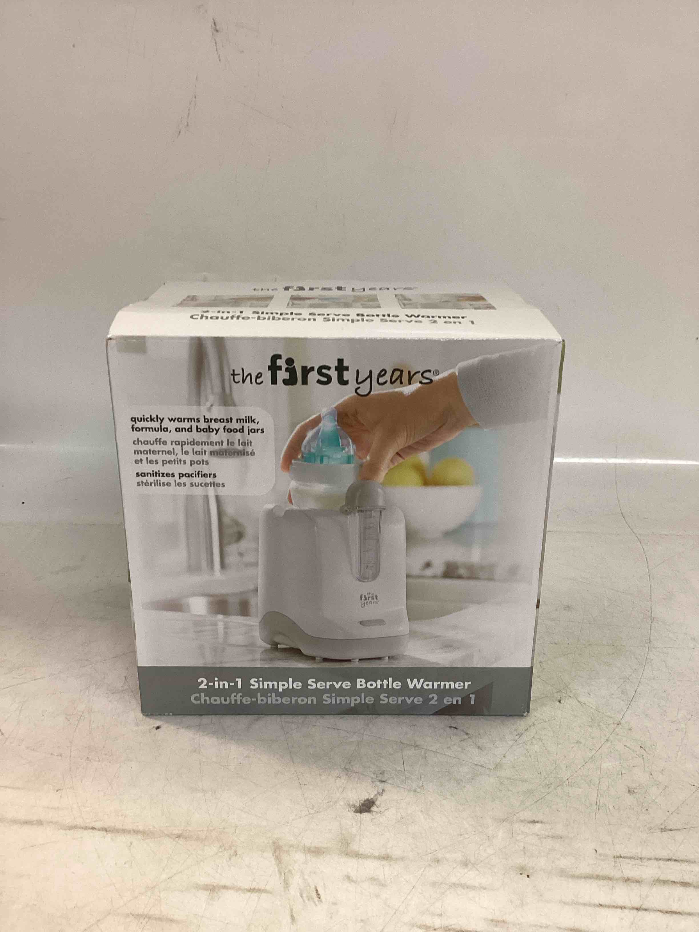 the first years baby bottle warmer and sterilizer - pacifier and bottle nipple sanitizer - feeding baby essentials for formula or breast milk - holds multiple sizes