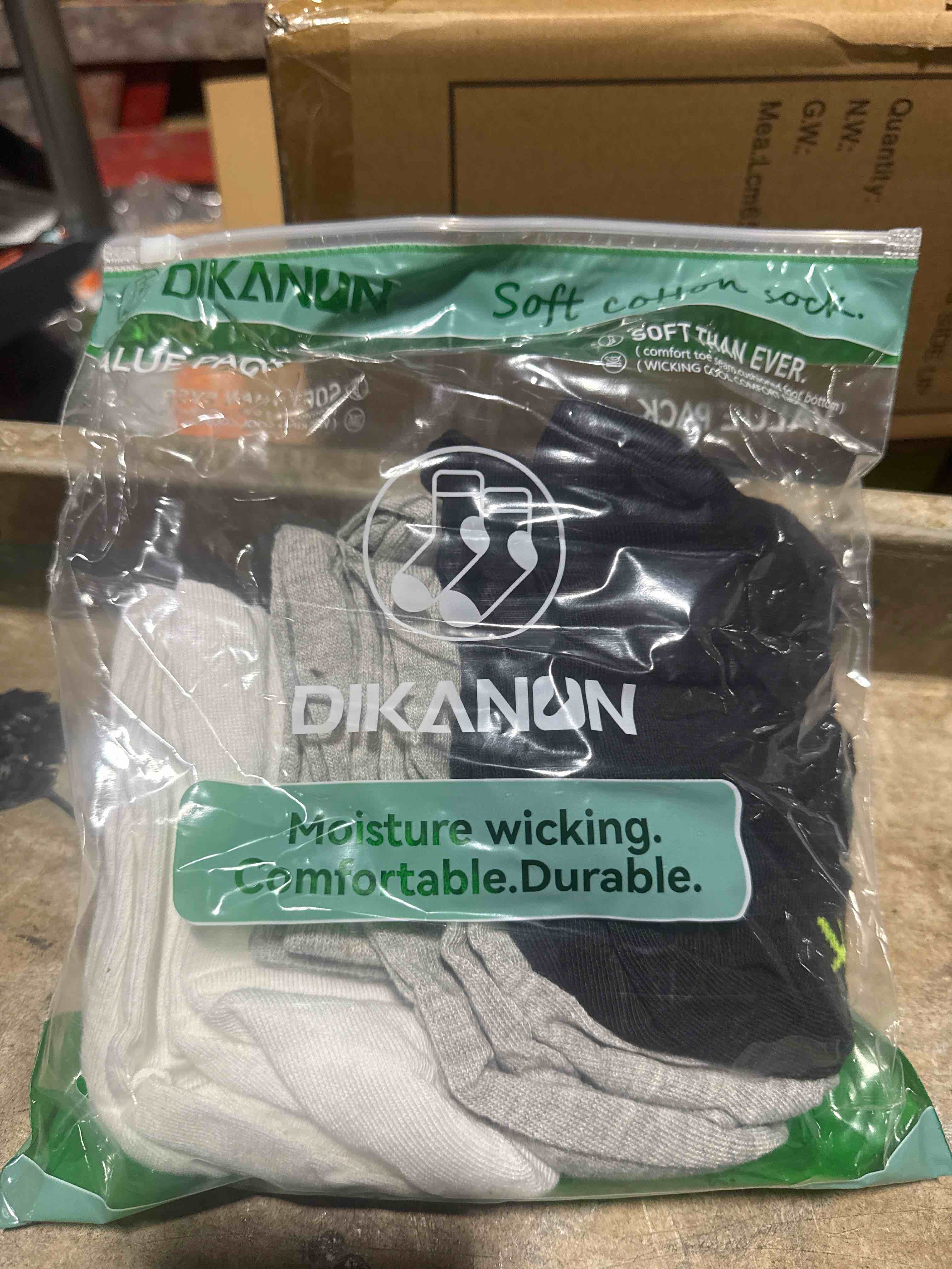 Condition photo showing New/Like New for dikanun moisture-wicking crew socks, 12-pack (black, gray & white)