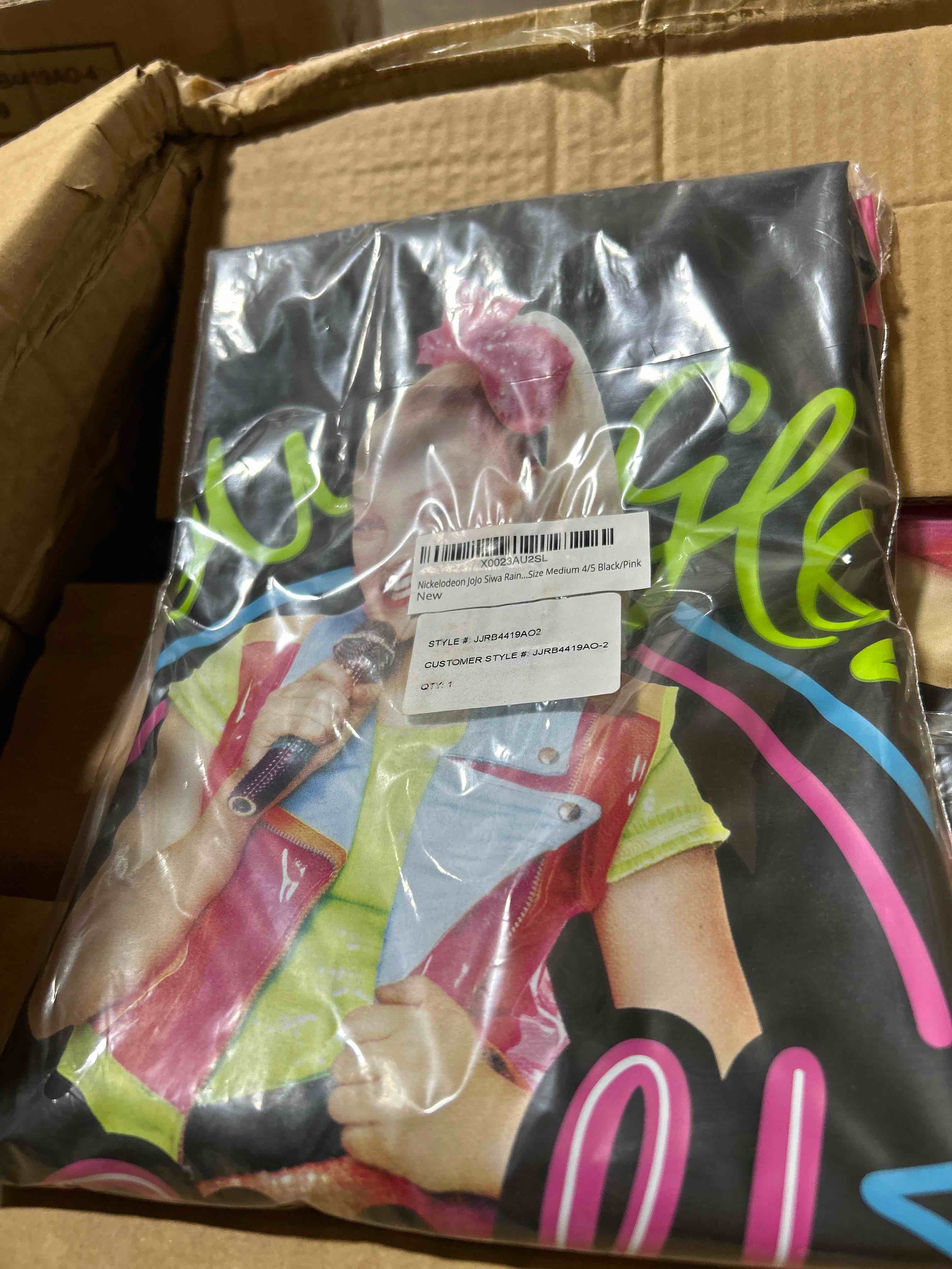 Condition photo showing Brand New for medium 4/5 nickelodeon, jojo siwa rain slick size medium 45 blackpink