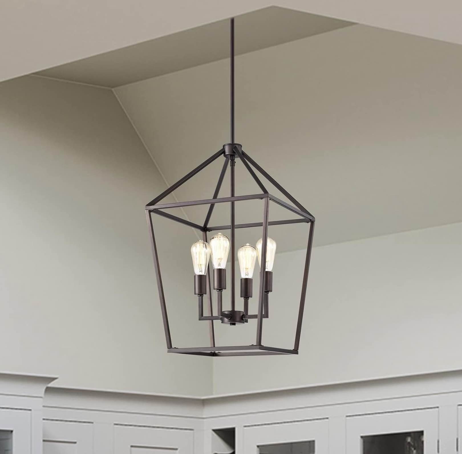 “Similar to stock photo “MICSIU 900004 Light Pendant Lighting for Kitchen Island, Oil Rubbed Bronze Dining Room Ceiling Light Over Table with E26 Base Socket, Hanging Pendant Light for Multiple Rooms Cage 4-Light Bronze