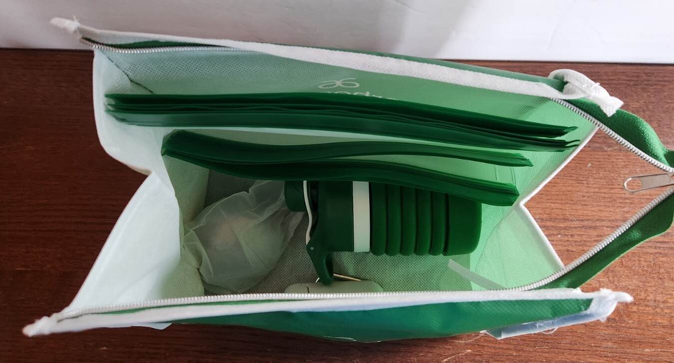 https://s3.amazonaws.com/lotting-images-prod/arbonnegreenbag_1753288740304.jpeg