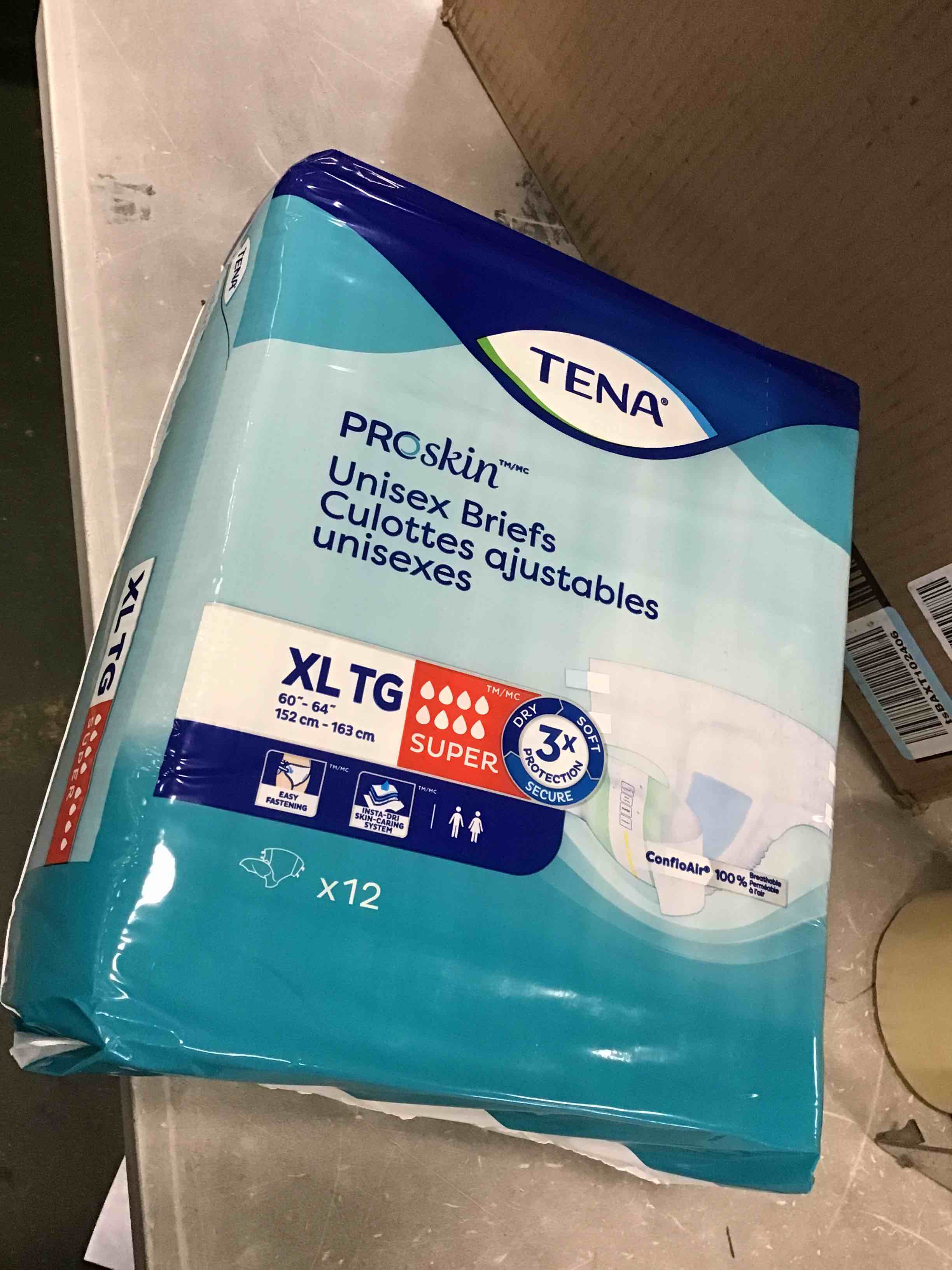 Condition photo showing New/Like New for tena incontinence briefs, super, xlarge 12 count