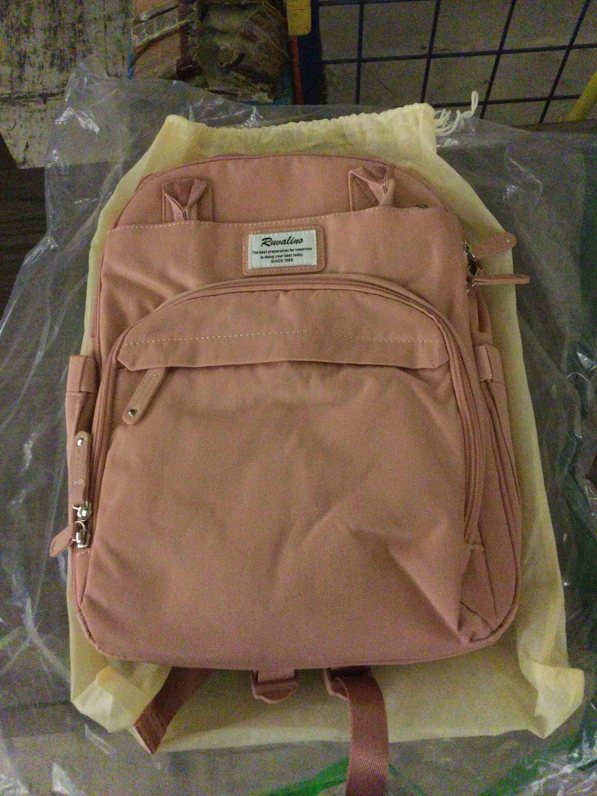 Condition photo showing Good Condition for RUVALINO Diaper Bag Backpack, Multifunction Travel Back Pack for Girls, Maternity Baby Changing Bags with Changing Pad for Mom, Large Capacity, Waterproof and Stylish, Pink