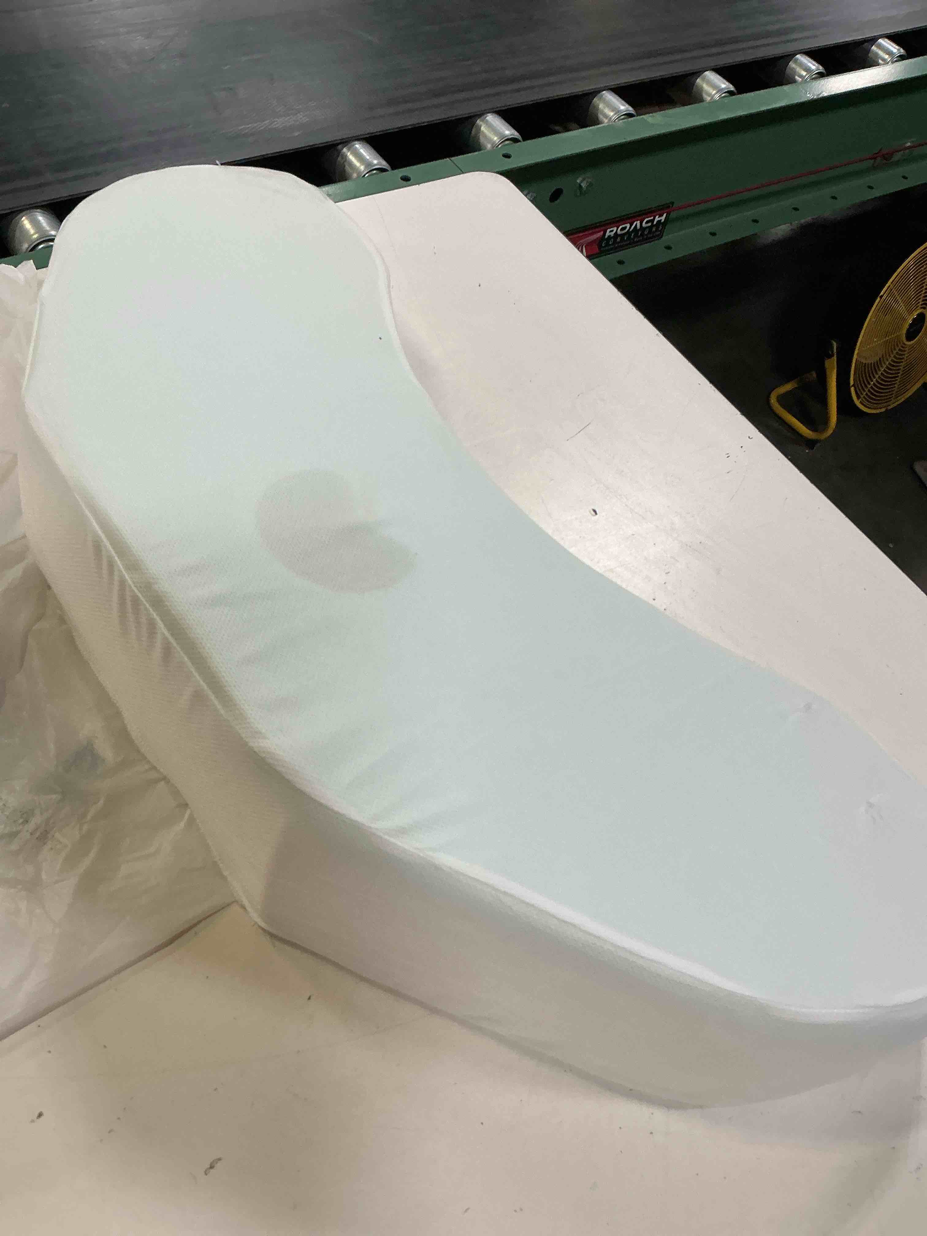 Condition photo showing As Is for ergonomic memory foam side-sleeper pillow, specifically designed with a contoured shape to relieve shoulder and neck pressure (missing cover)