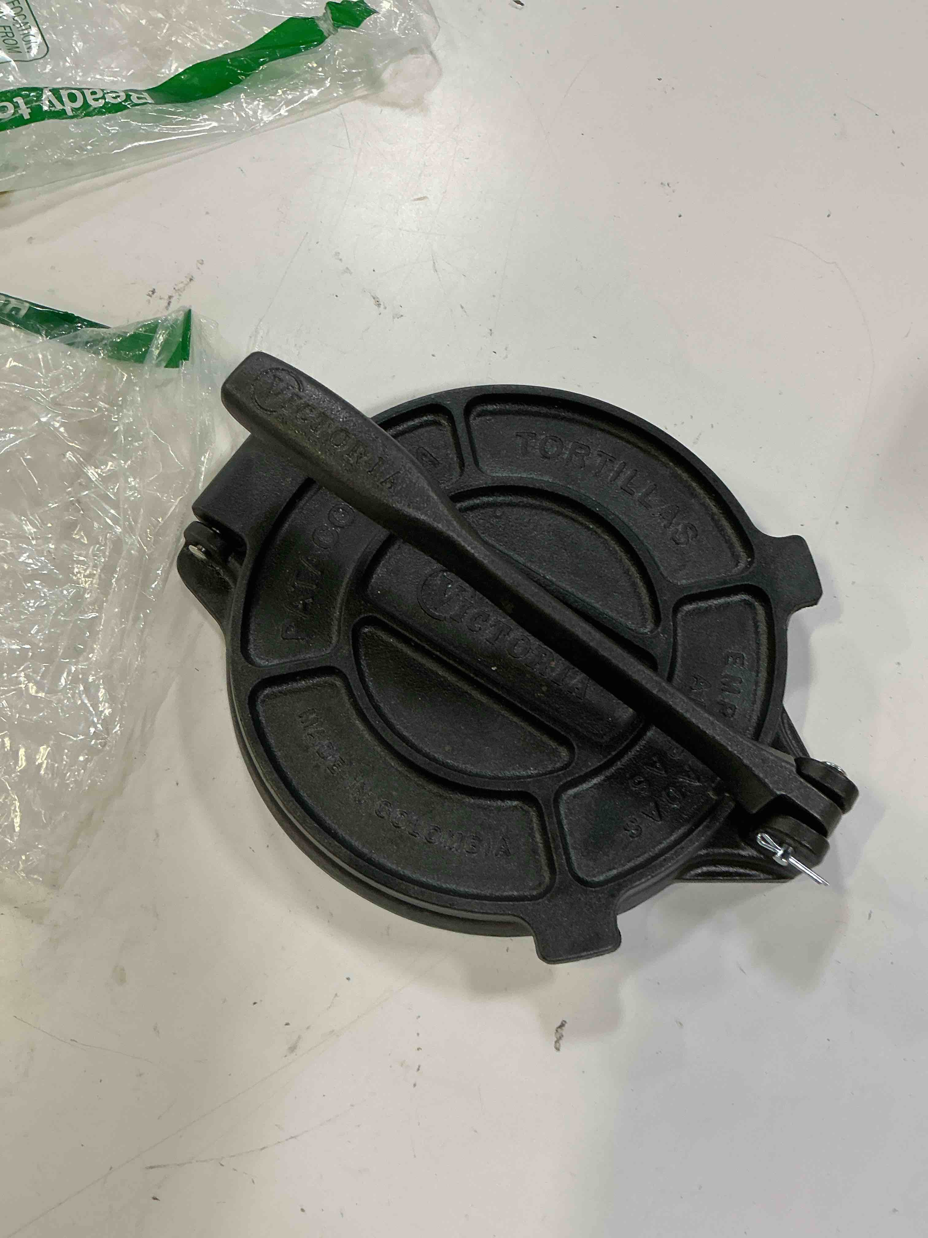 Condition photo showing Good Condition for victoria 8 inches cast iron tortilla press, roti maker and tortilladora, pataconera seasoned with flaxseed oil, made in colombia, traditional style, black | pataconera, seasoned with flaxseed oil, made in colombia, traditional style, black