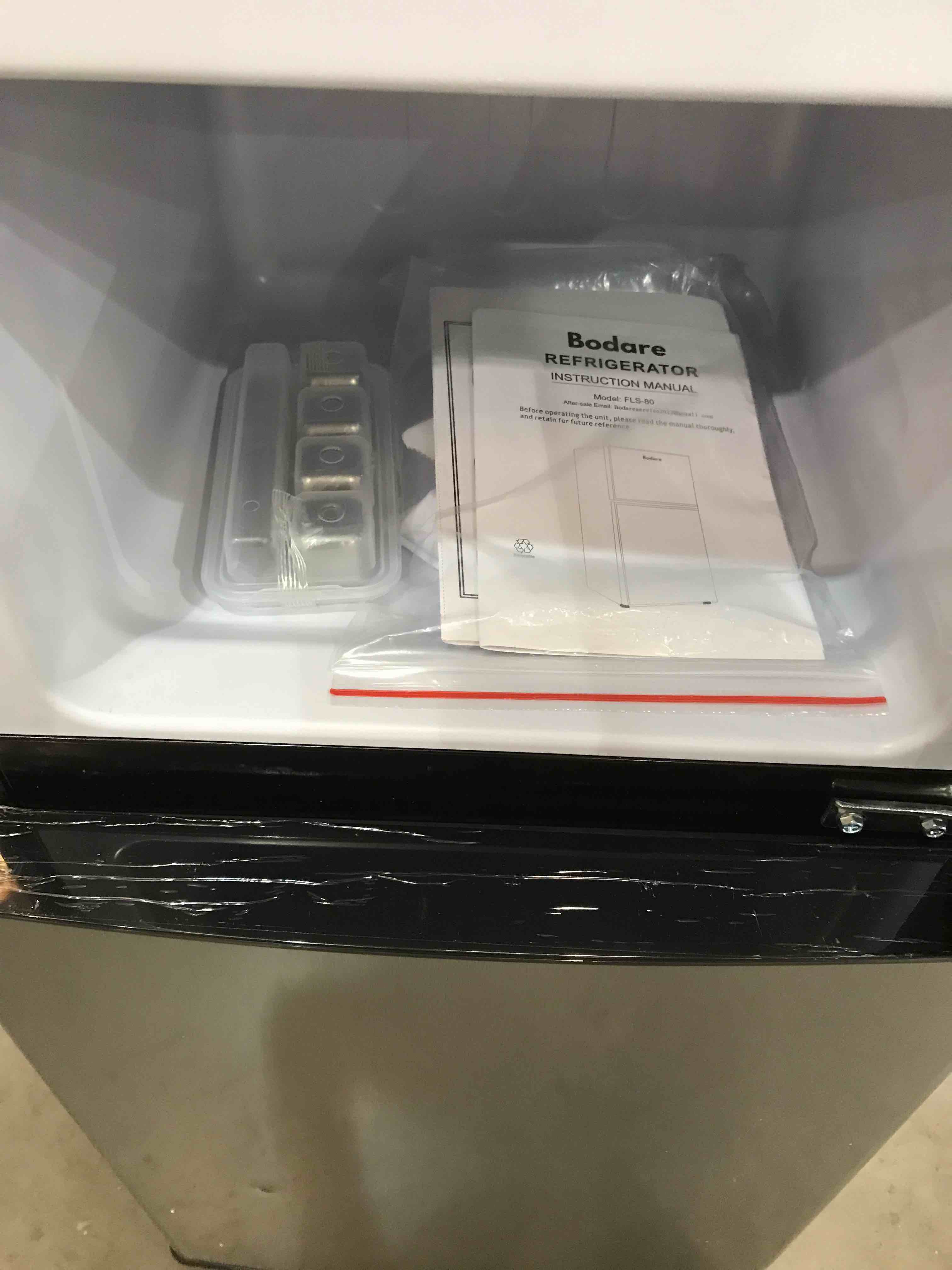 https://s3.amazonaws.com/lotting-images-prod/bidfta/BHL00096470_1694443581882.jpeg