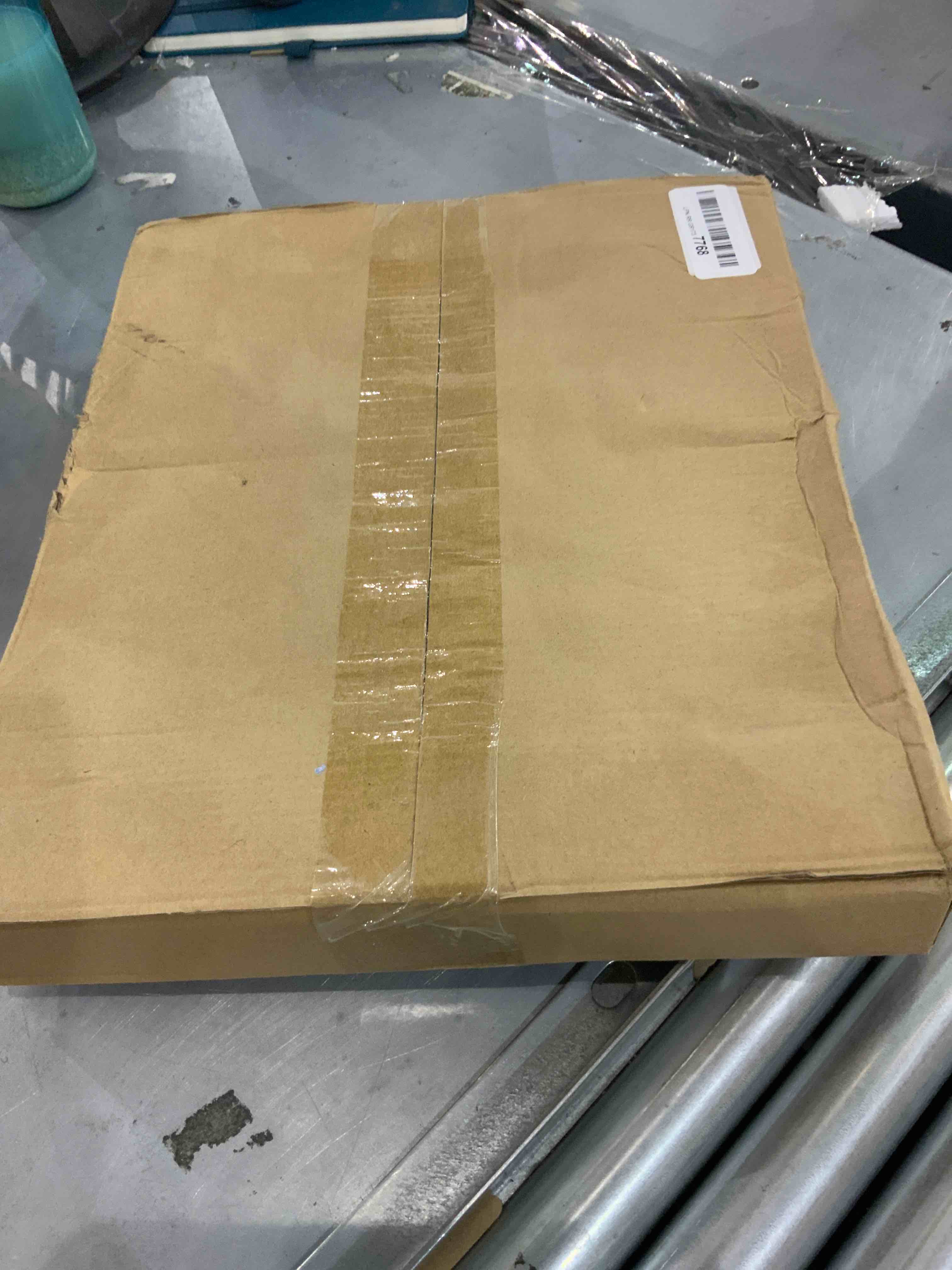 https://s3.amazonaws.com/lotting-images-prod/bidfta/BHS90004222_1692014402608.jpeg