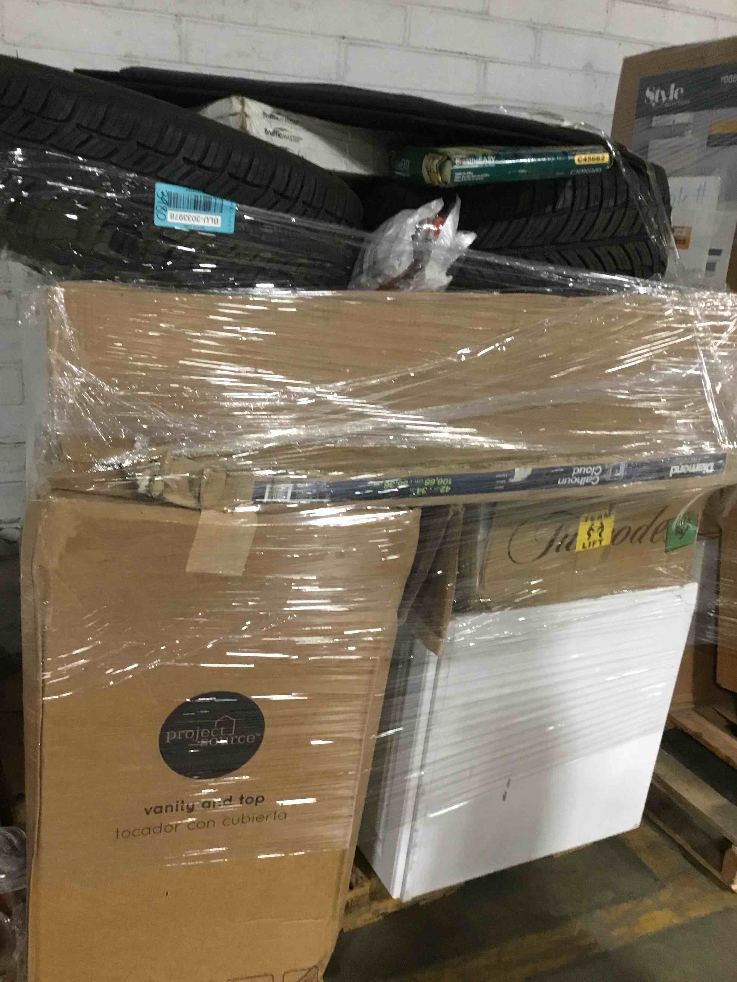 Handyman Pallet Lot, Includes Bathroom Vanities, Tires, Led Tires, Air Filters And More