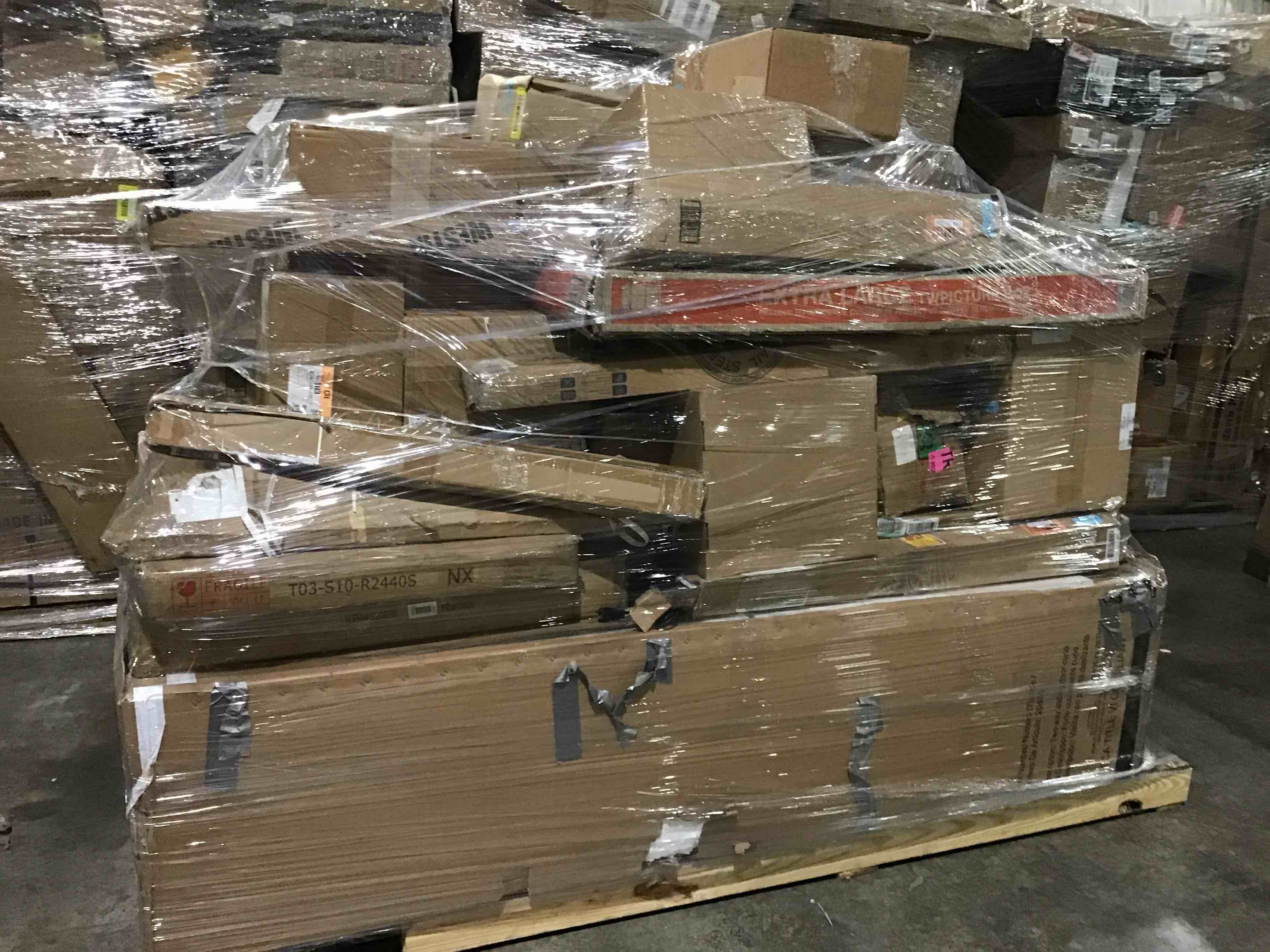 Pallet lot of assorted items- includes furniture, decor and more 