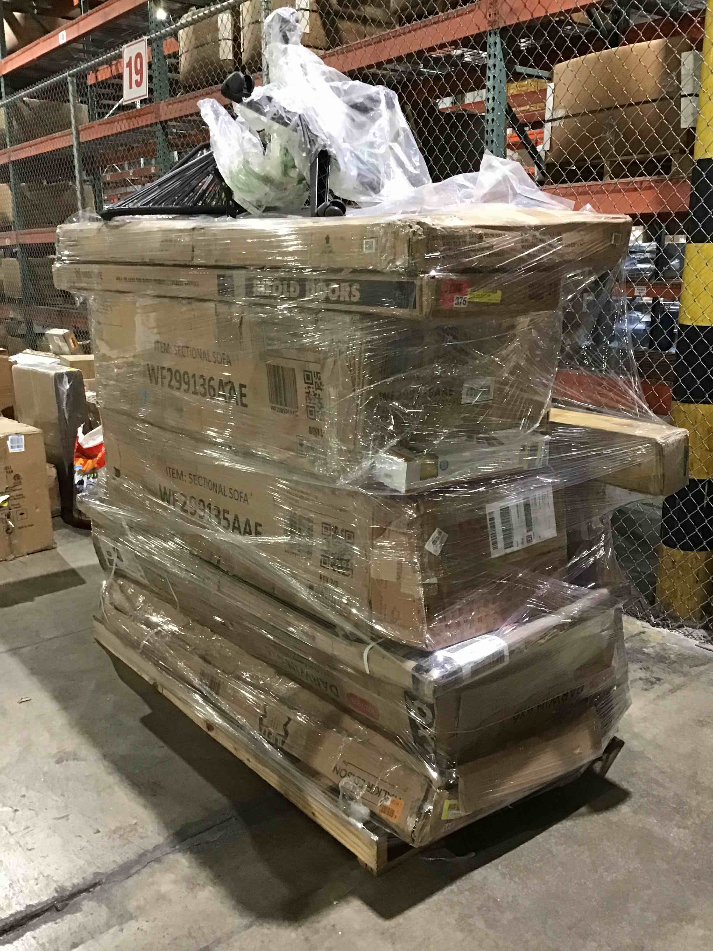 Pallet lot of assorted items- includes furniture, decor and more 