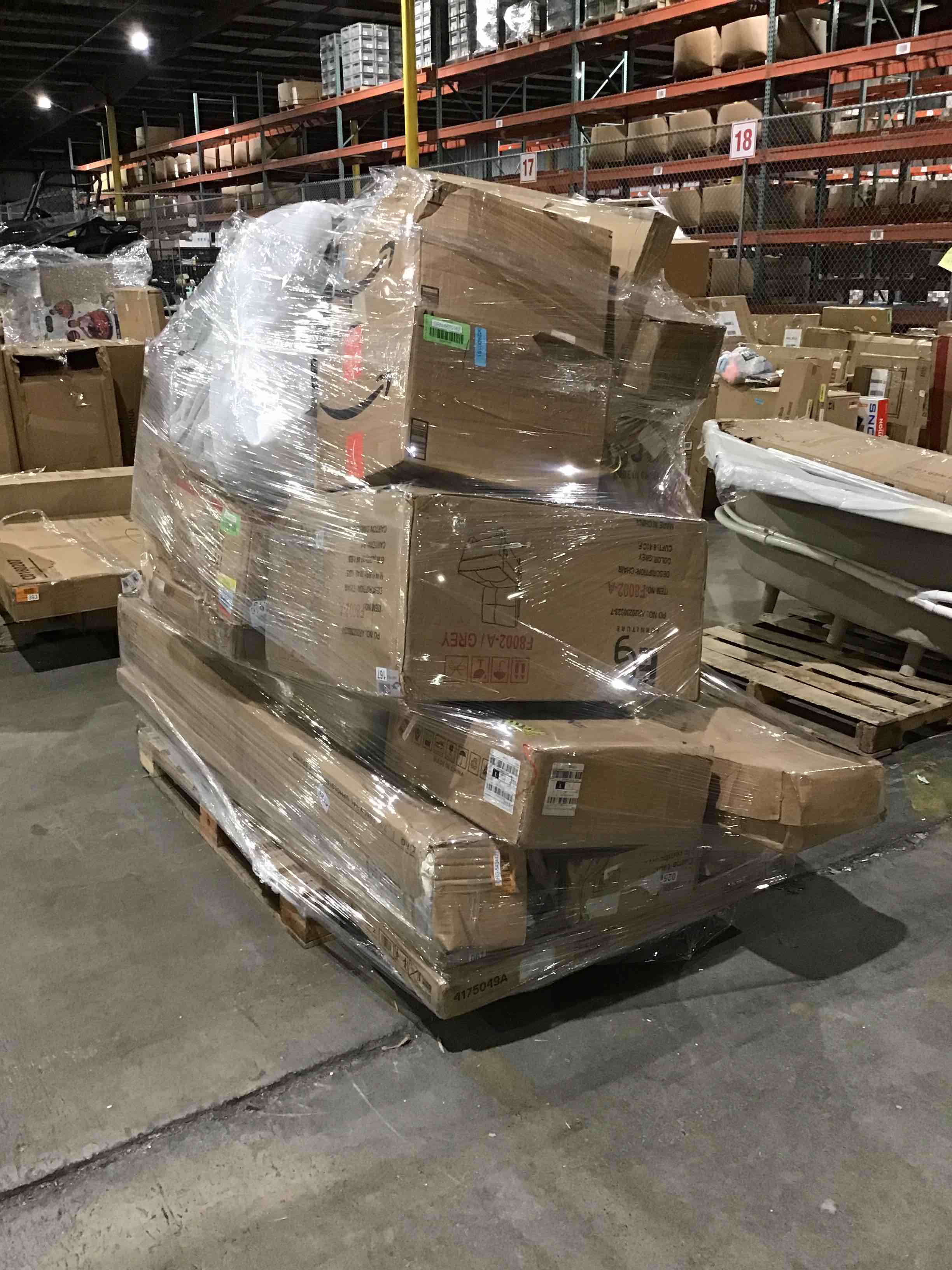 Pallet lot of assorted items- includes furniture, decor and more 