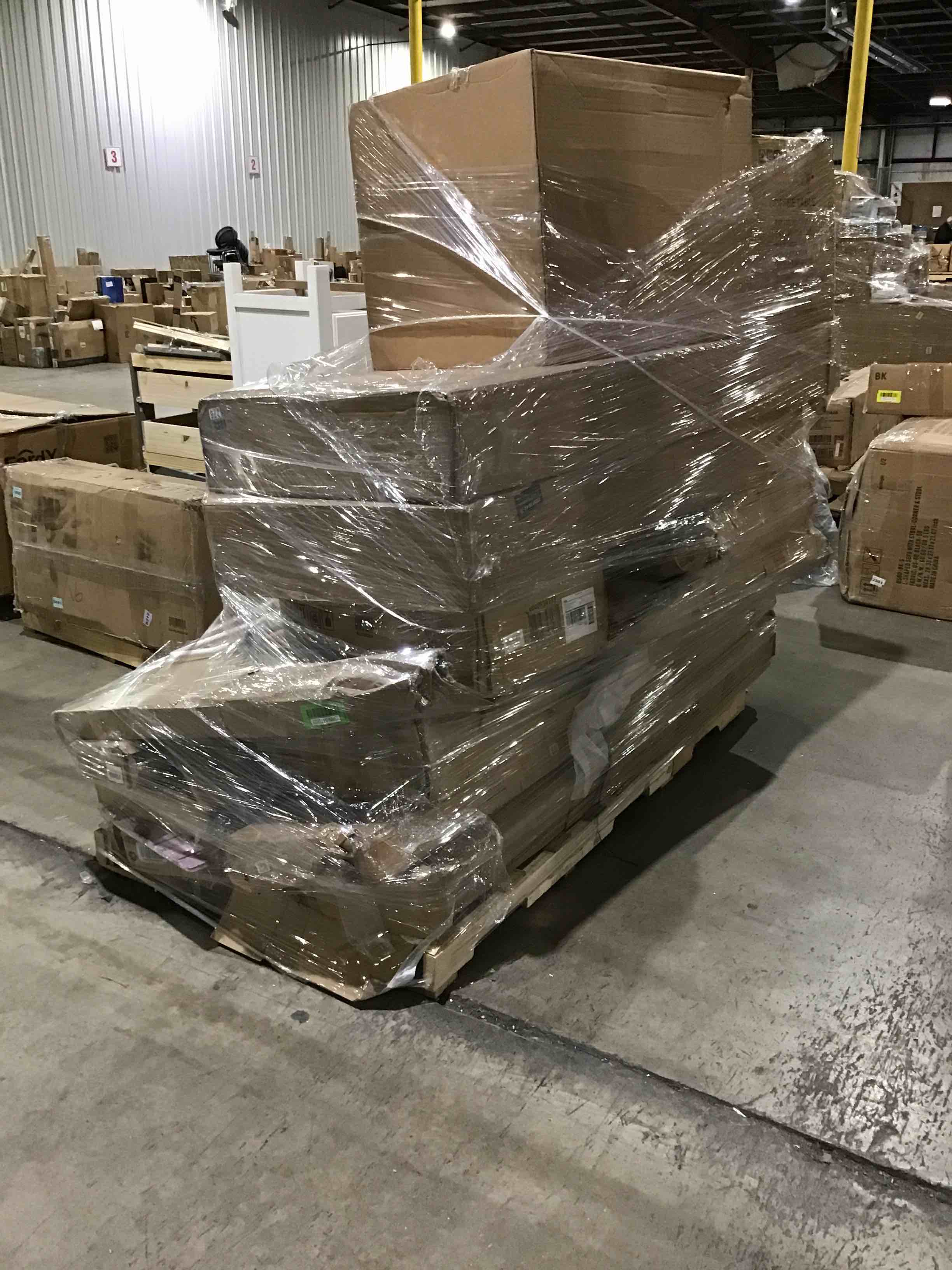 Pallet lot of assorted items- includes furniture, decor and more 