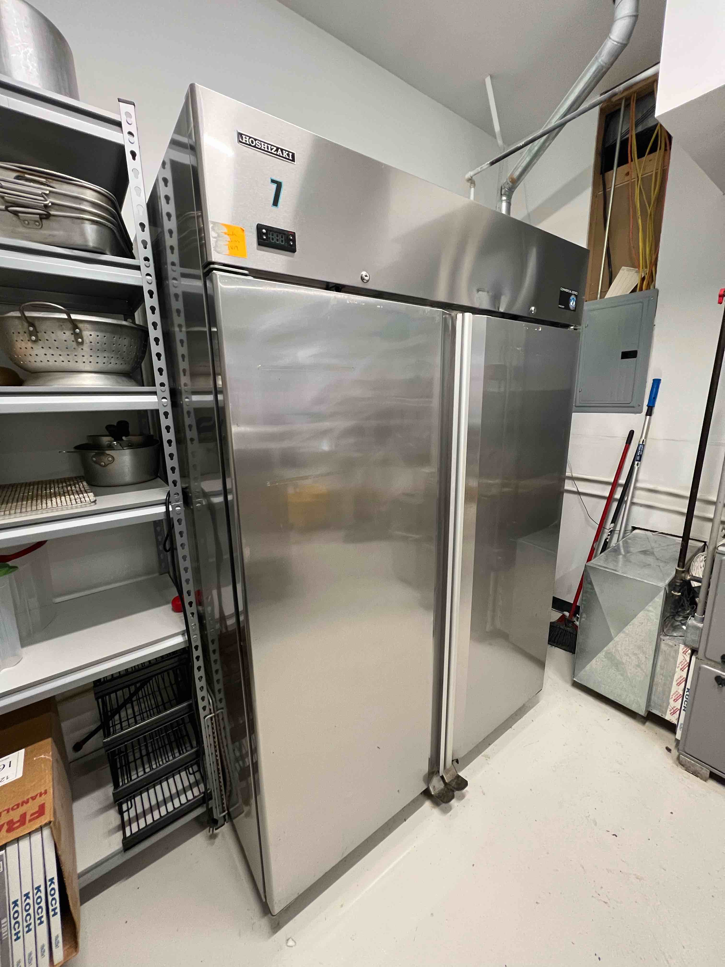 HOSHIZAKI STAINLESS STEEL TWO DOOR REACH IN FREEZER ON CASTERS