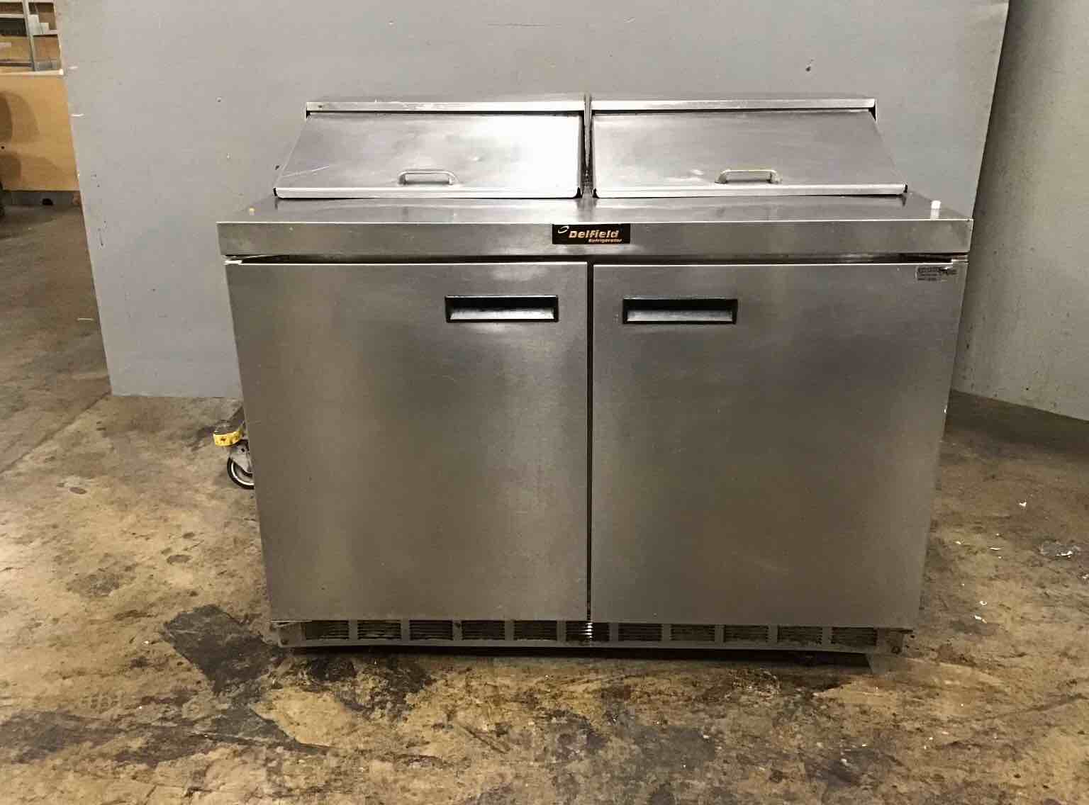 Delfield 48 Inch Stainless Steel 2 Door Refrigerated Sandwich Prep Table  On Casters 