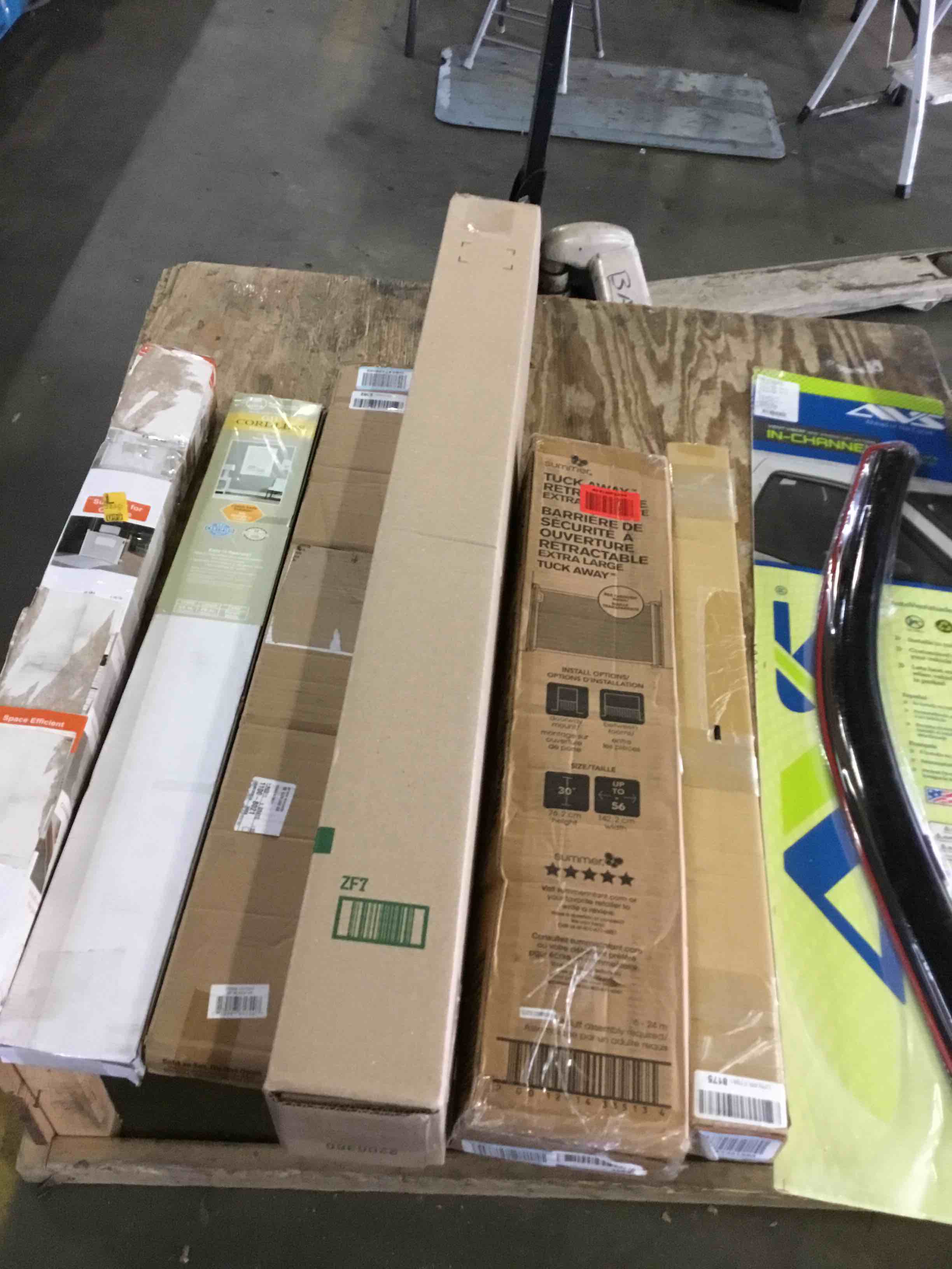 assorted items ( baby gates, window deflectors cordless blind and more )