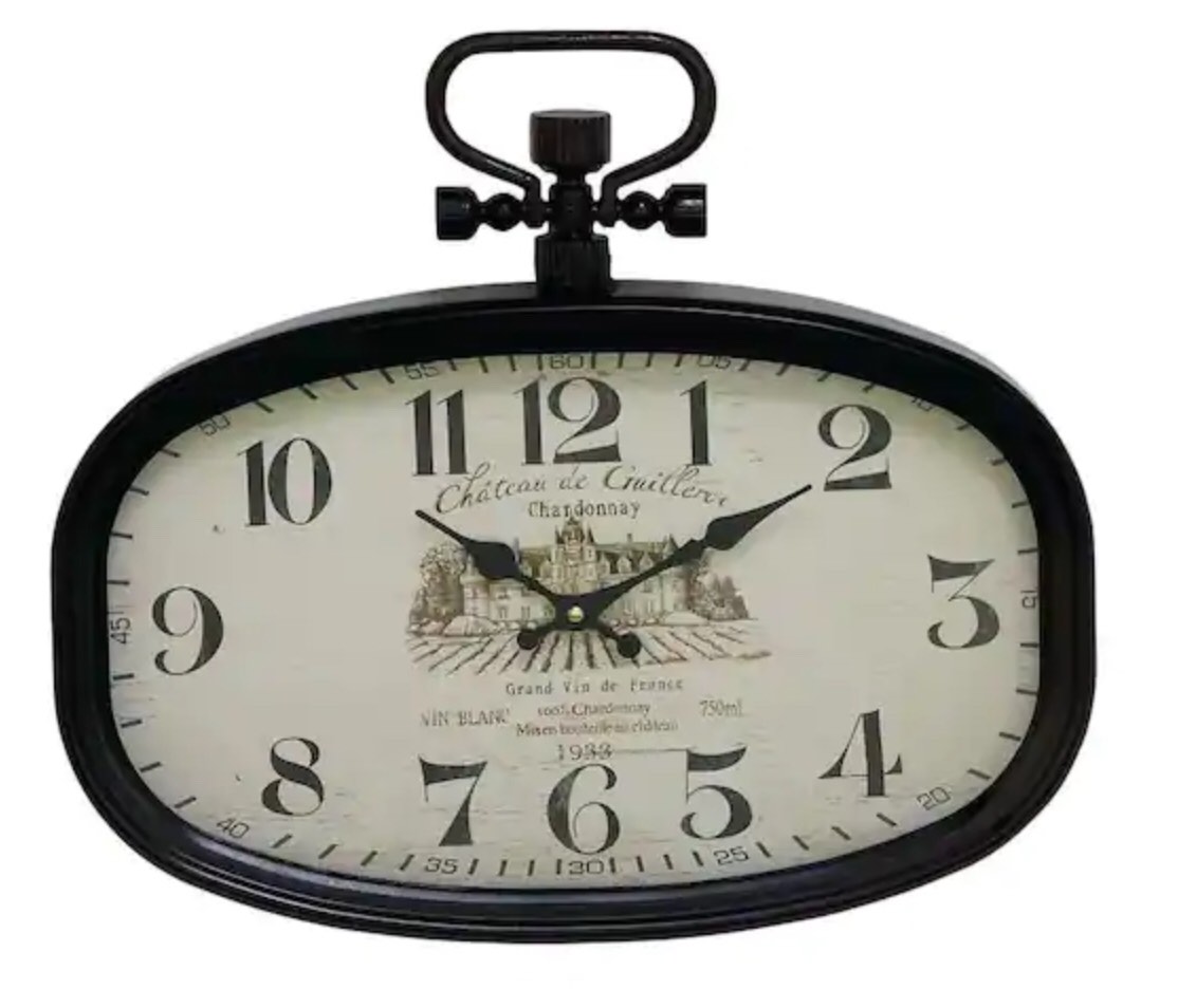 Metal oval wall clock 