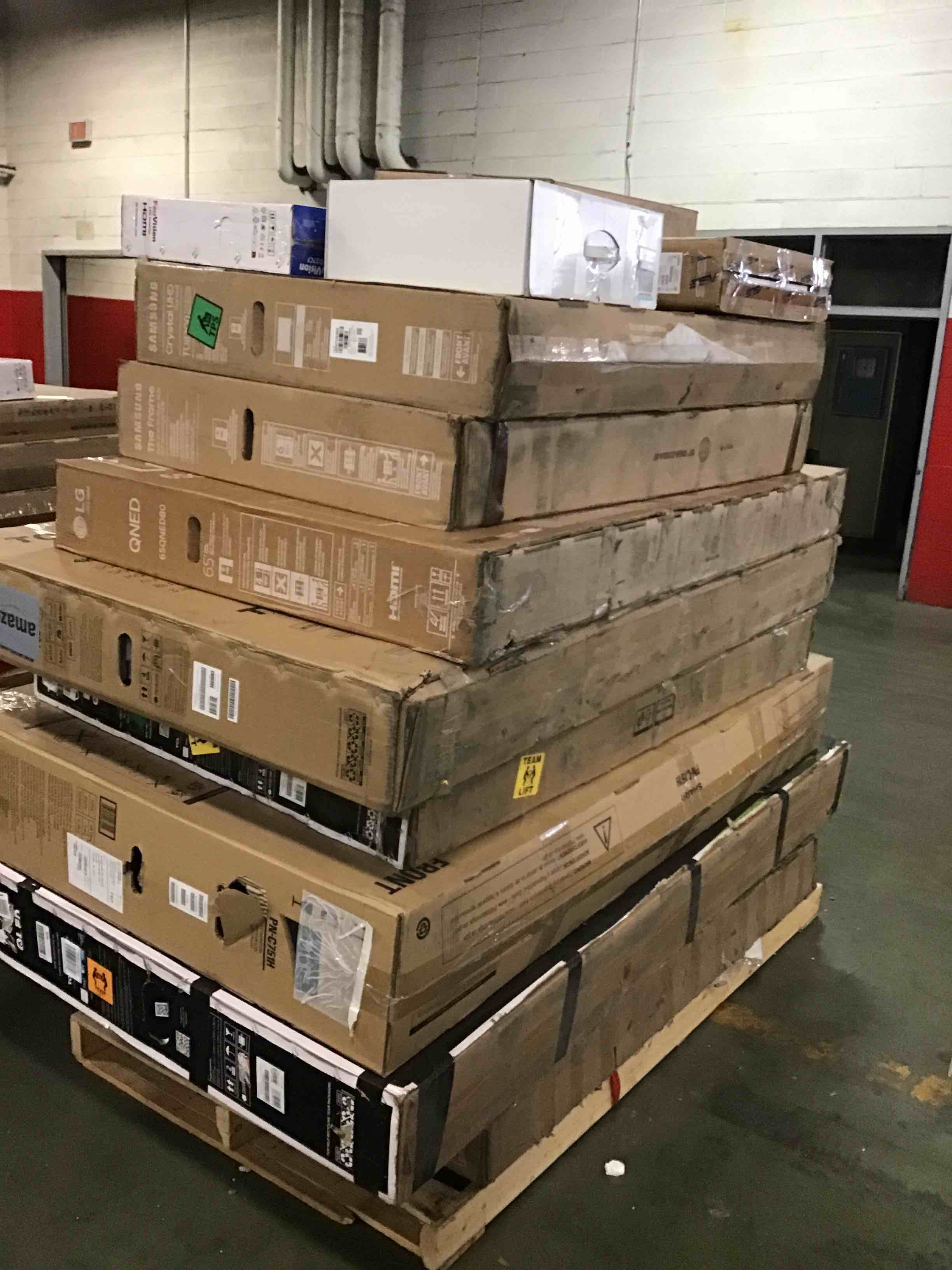 pallet of defective televisions,monitor,ps5,