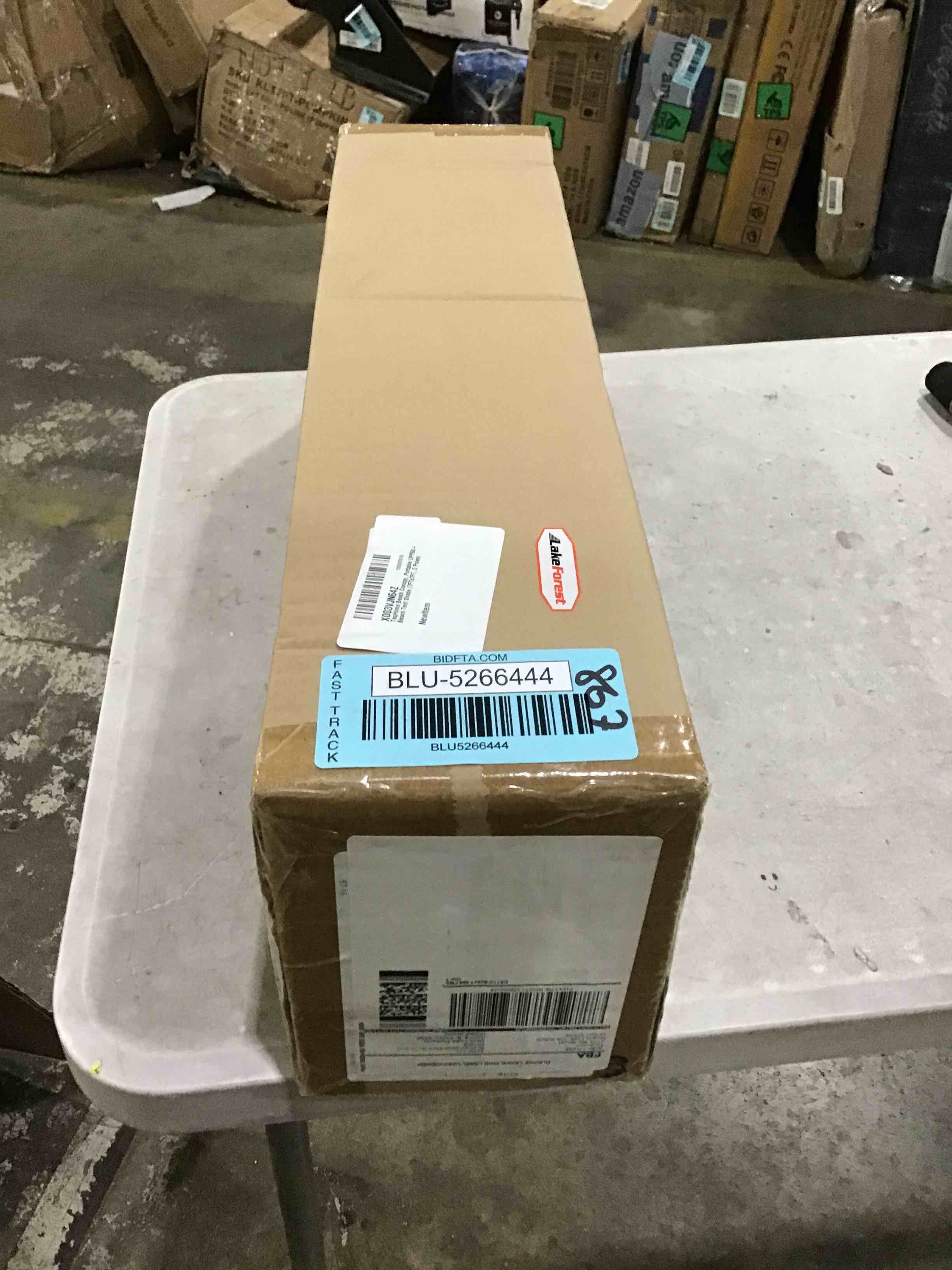 https://s3.amazonaws.com/lotting-images-prod/bidfta/BLU5266444_1713195594544.jpeg