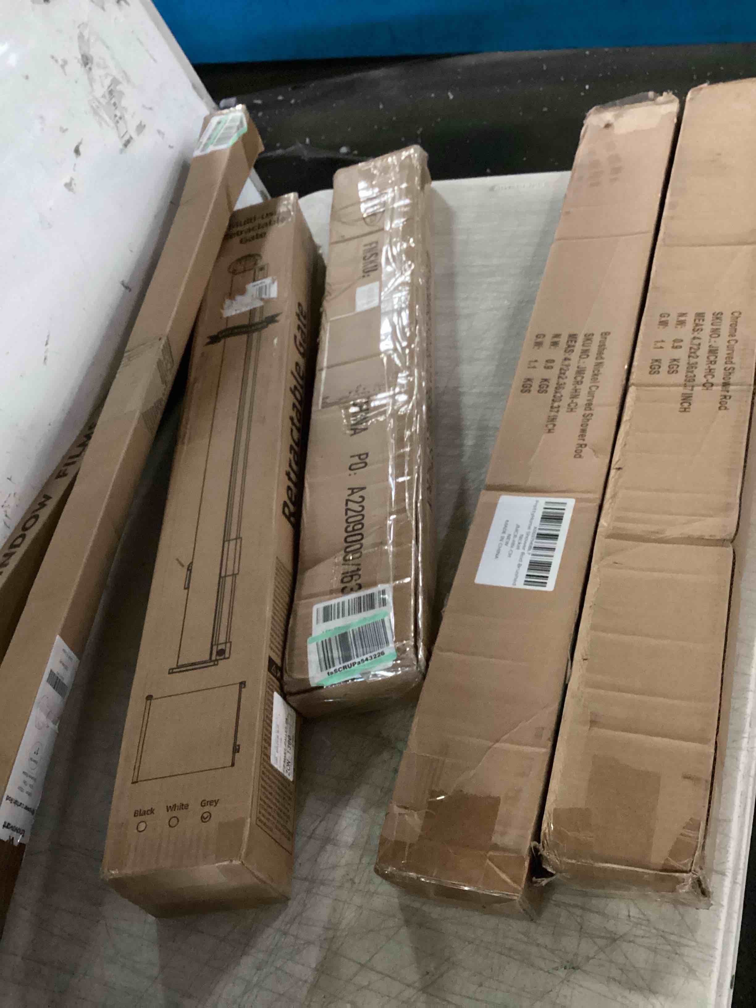assorted item miscellaneous curtain rod/ retractable gate and more 