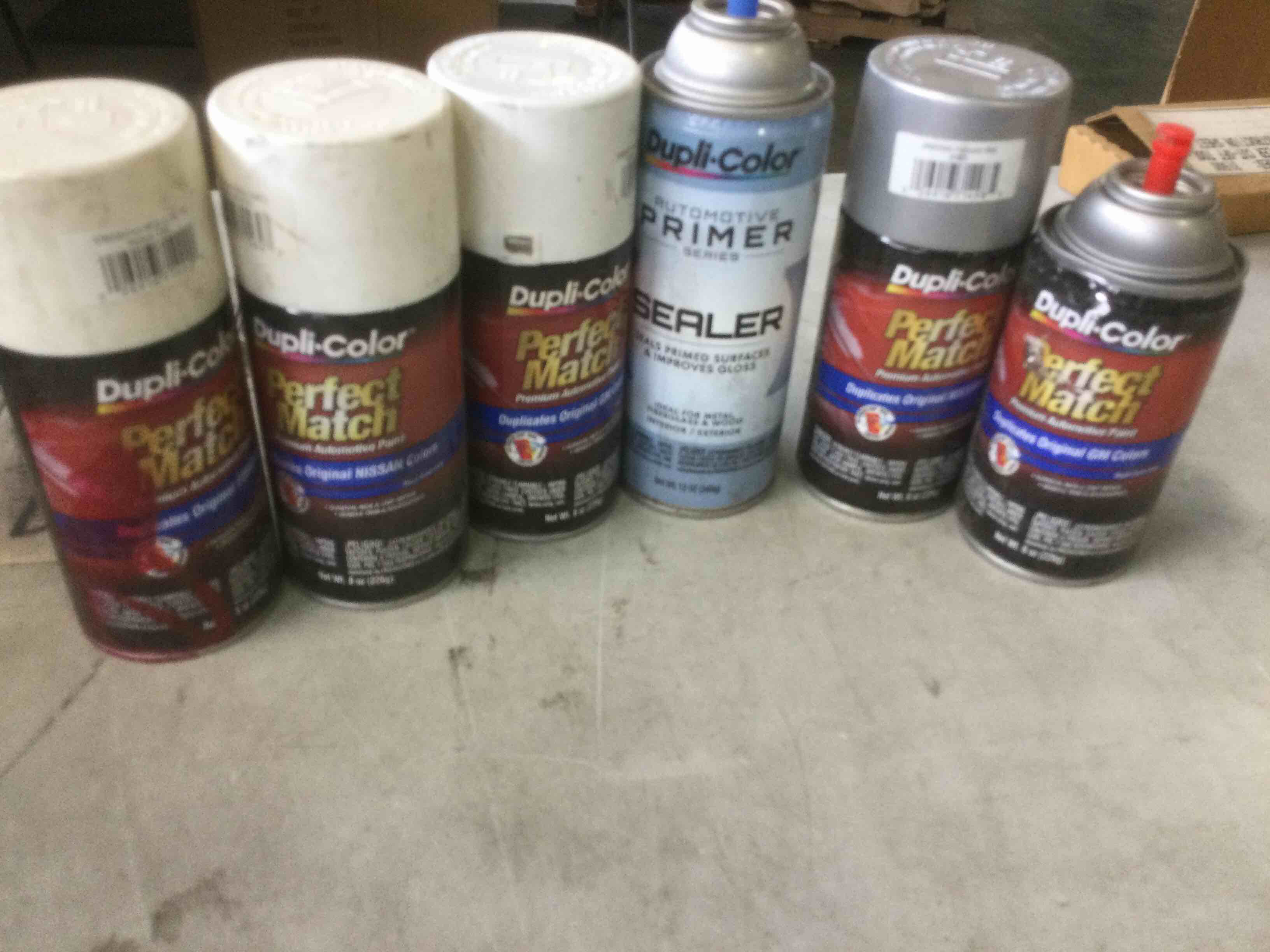 assorted automotive and home spray paint 