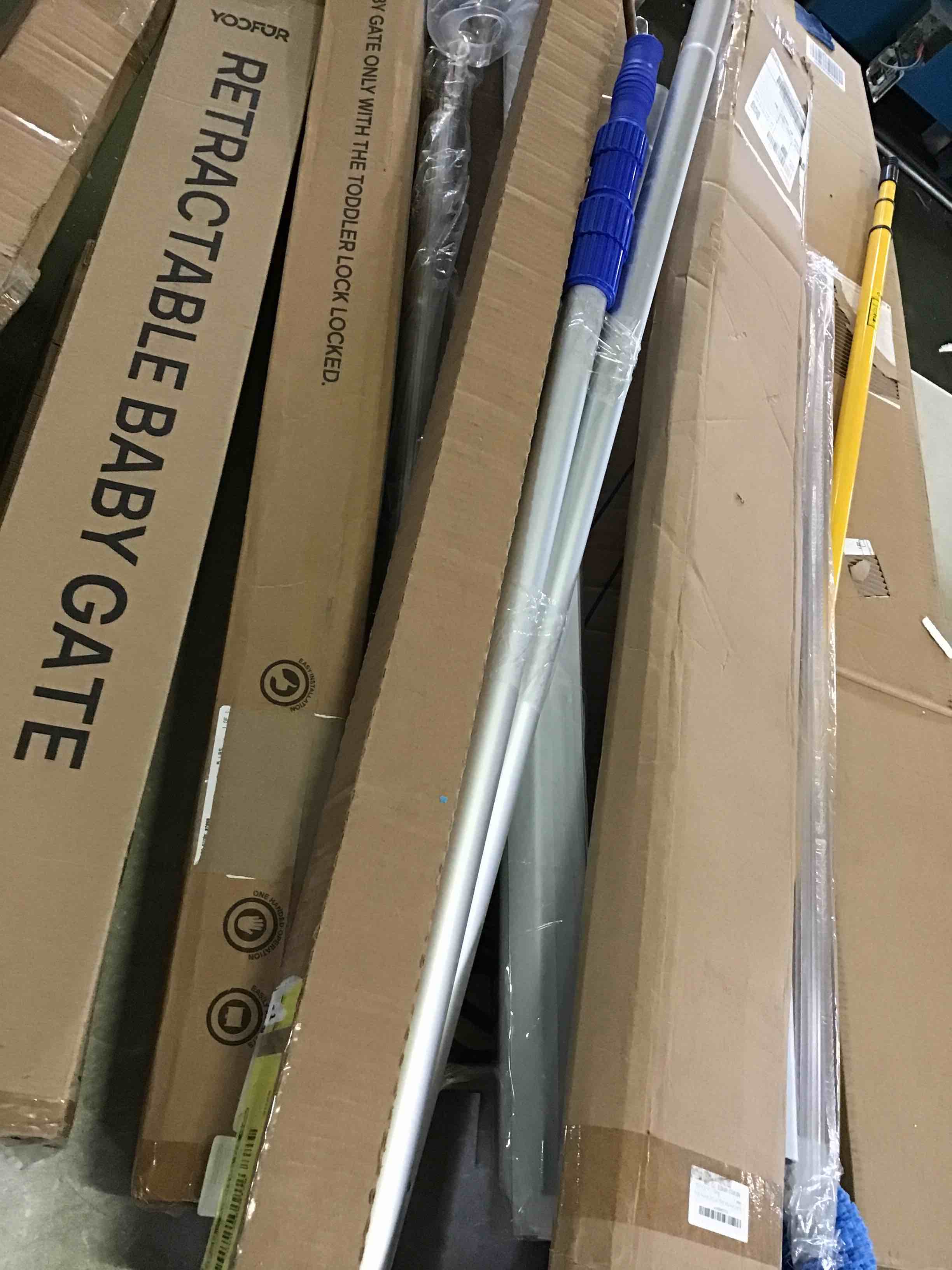 assorted baby gates,umbrella,curtain rods,and more 
