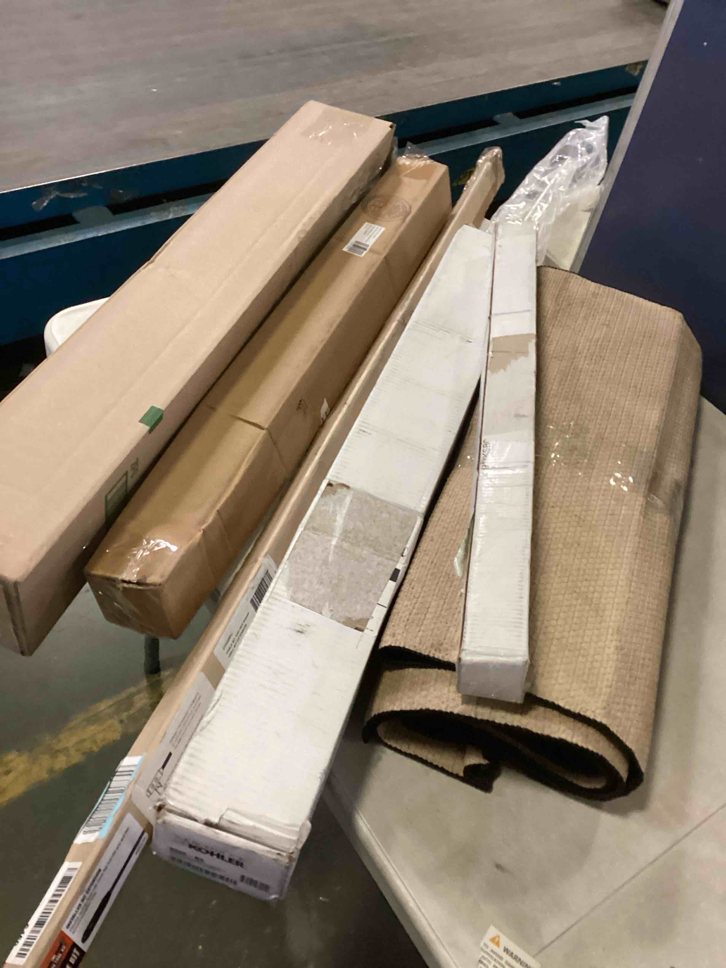 Assortment of Miscellaneous products (May Include cordless shade, curtain rods, retractable baby gate, Led universal linear lamp and more or other use)