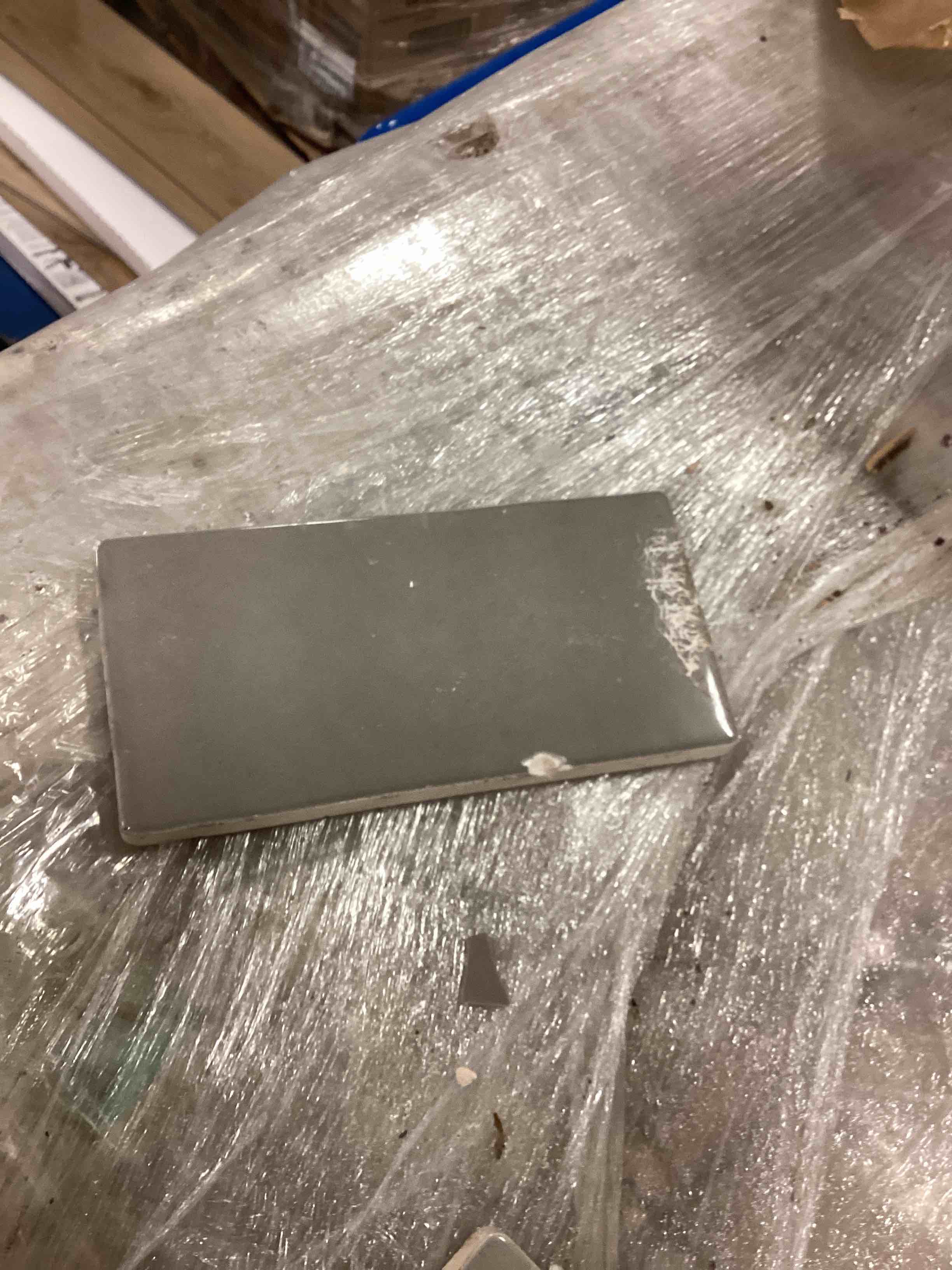 skid of tile. boxes get wet. unknown square foot. 3x6” tile 