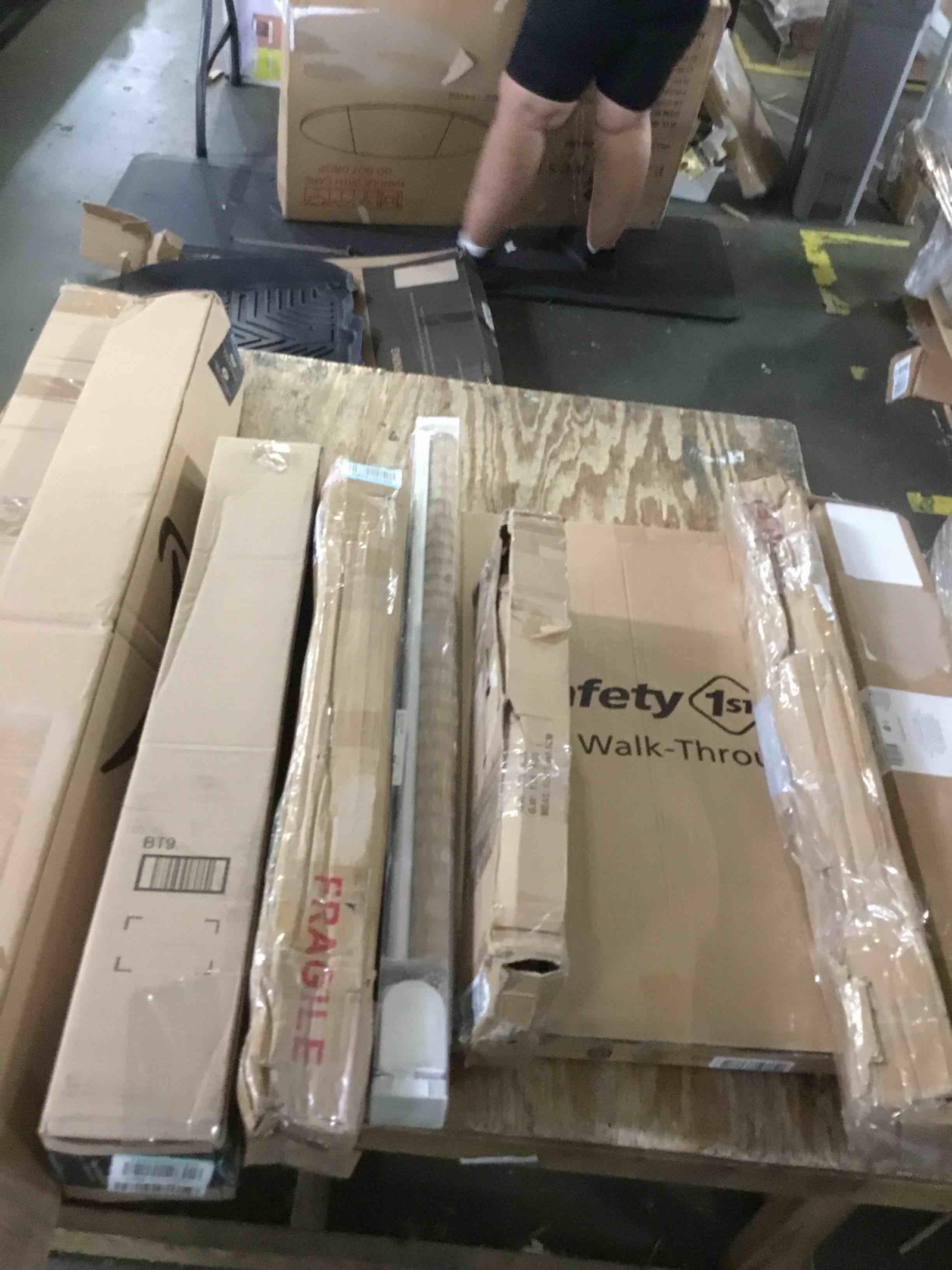 assorted miscellaneous items (baby gates, curtain rods, bubble umbrella)